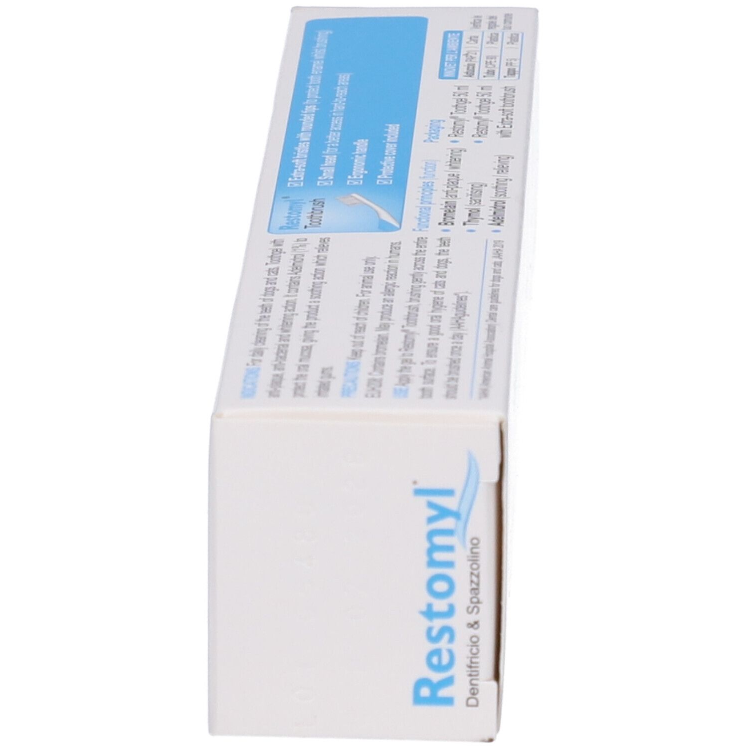 Confezione in cartone Restomyl dentifricio & spazzolino, lato frontale con nome prodotto e ingredienti.