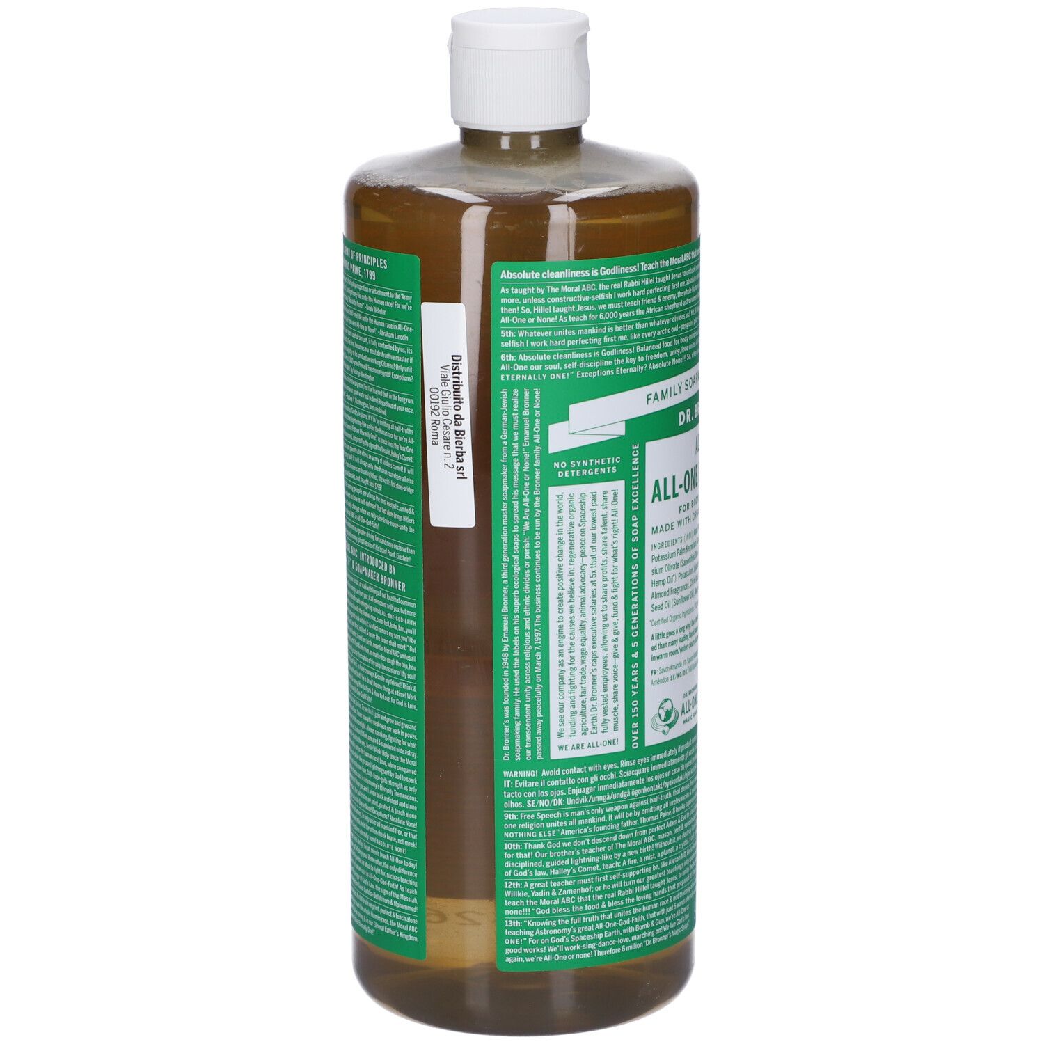 Vista posteriore di una bottiglia trasparente con etichetta verde. L'etichetta riporta "DR. BRONNER'S". Il collo della bottiglia è bianco.