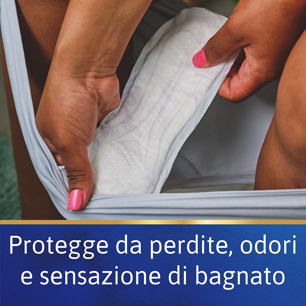 Mani che tengono Tena® Lady Discreet Ultra Mini. Testo: Protegge da perdite, odori e sensazione di bagnato.