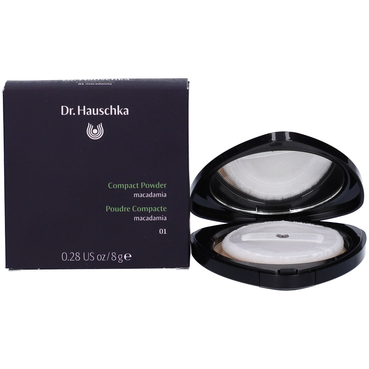 Cipria compatta con confezione. Cipria nera triangolare, con specchio. Scatola: Dr. Hauschka.