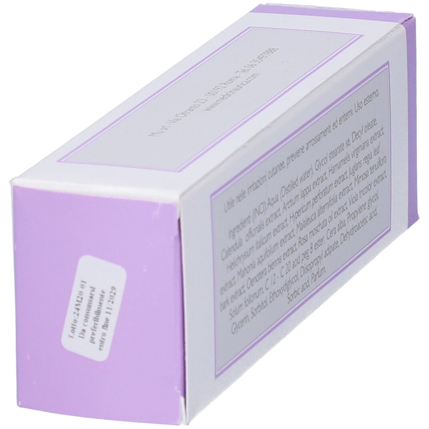 Scatola bianca con dettagli viola. Testo: ingredienti, istruzioni per l'uso. Vista angolata.