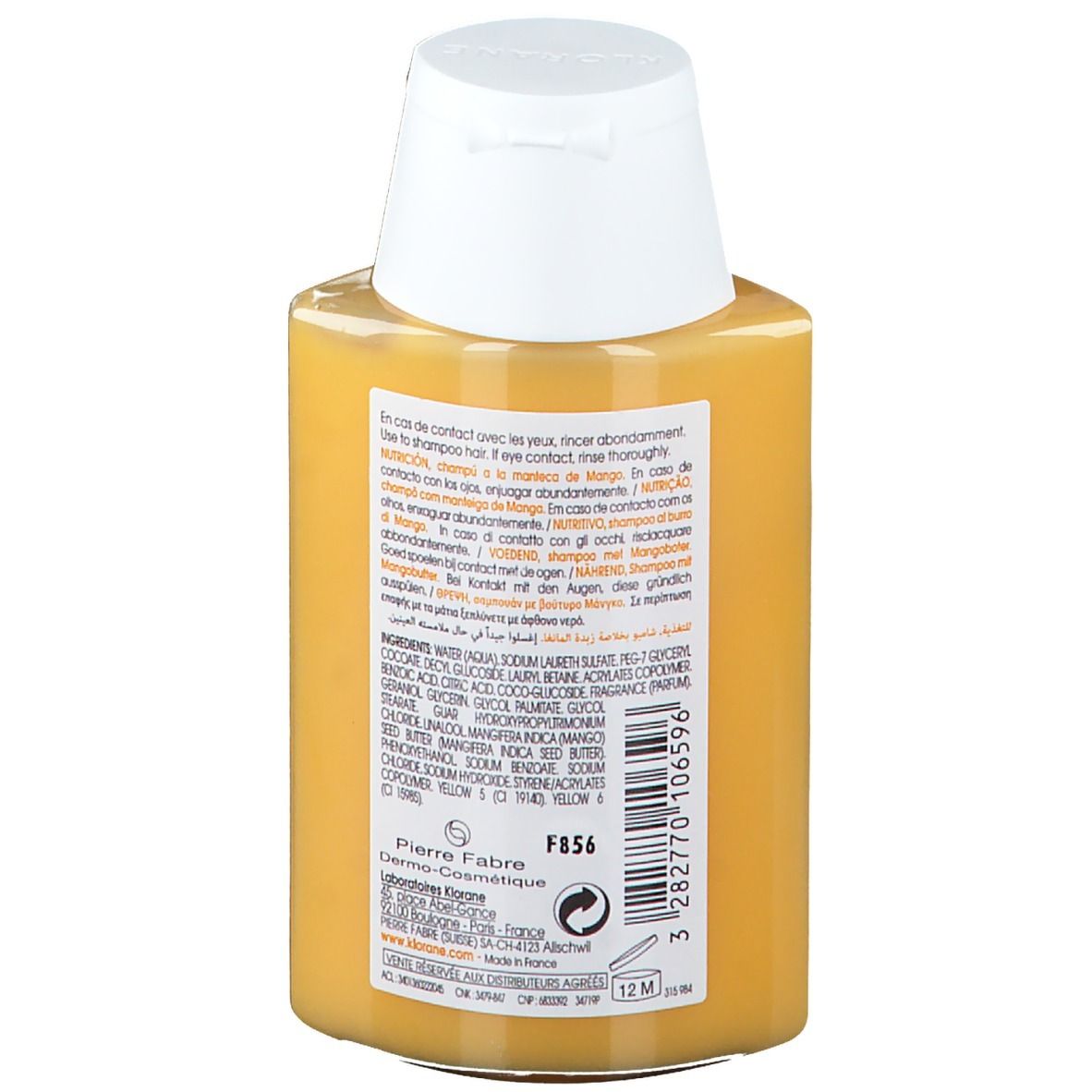 Retro del flacone di shampoo giallo. Etichetta con ingredienti e informazioni del produttore. Testo e codice a barre.