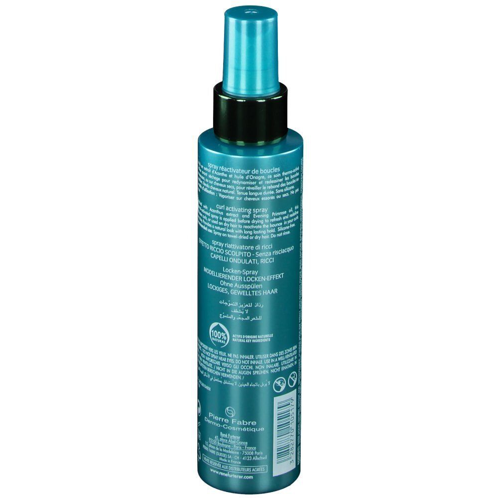 Retro del flacone spray turchese. Anello nero, erogatore blu. Testo e loghi sull'etichetta.