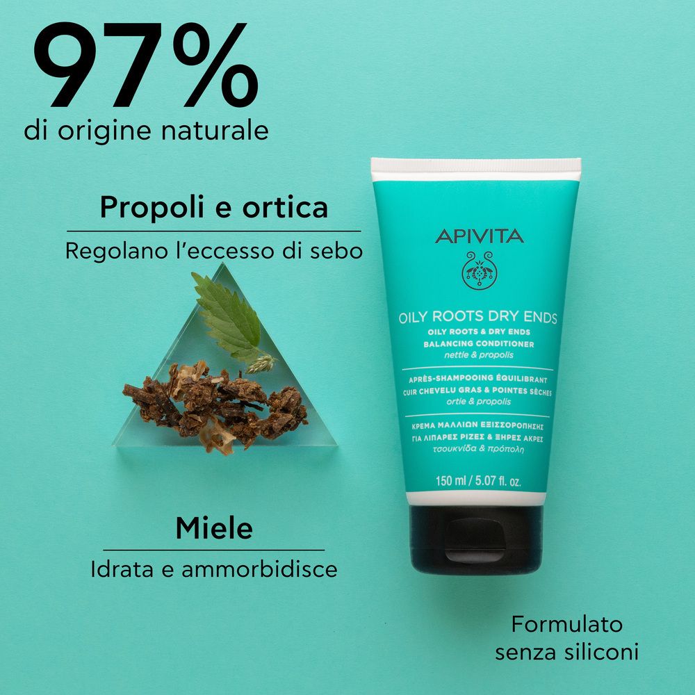 Tubo e ingredienti. Scritta: APIVITA, OILY ROOTS DRY ENDS, Balancing Conditioner. Testo: 97% di origine naturale, Propoli e ortica, Miele.