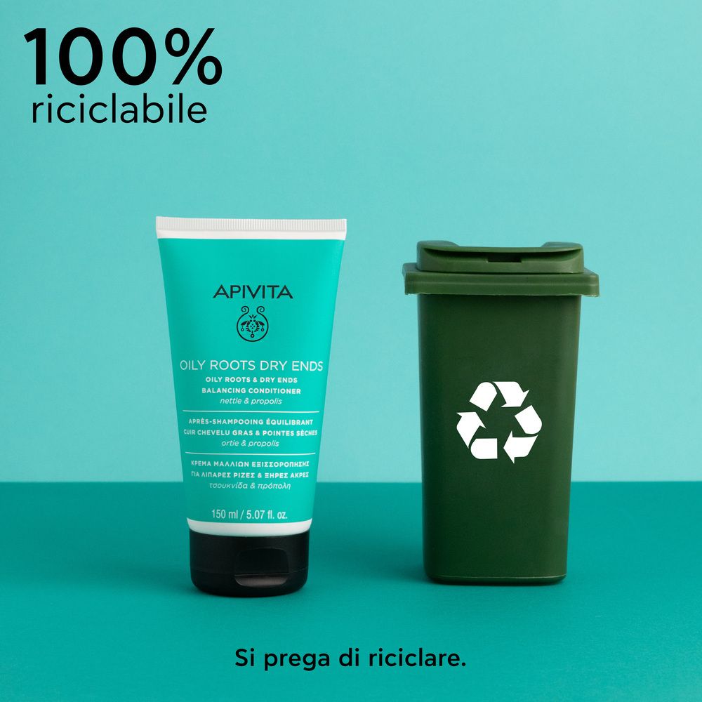 Tubo e bidone. Scritta: APIVITA, OILY ROOTS DRY ENDS, Balancing Conditioner. Testo: 100% riciclabile, Si prega di riciclare.