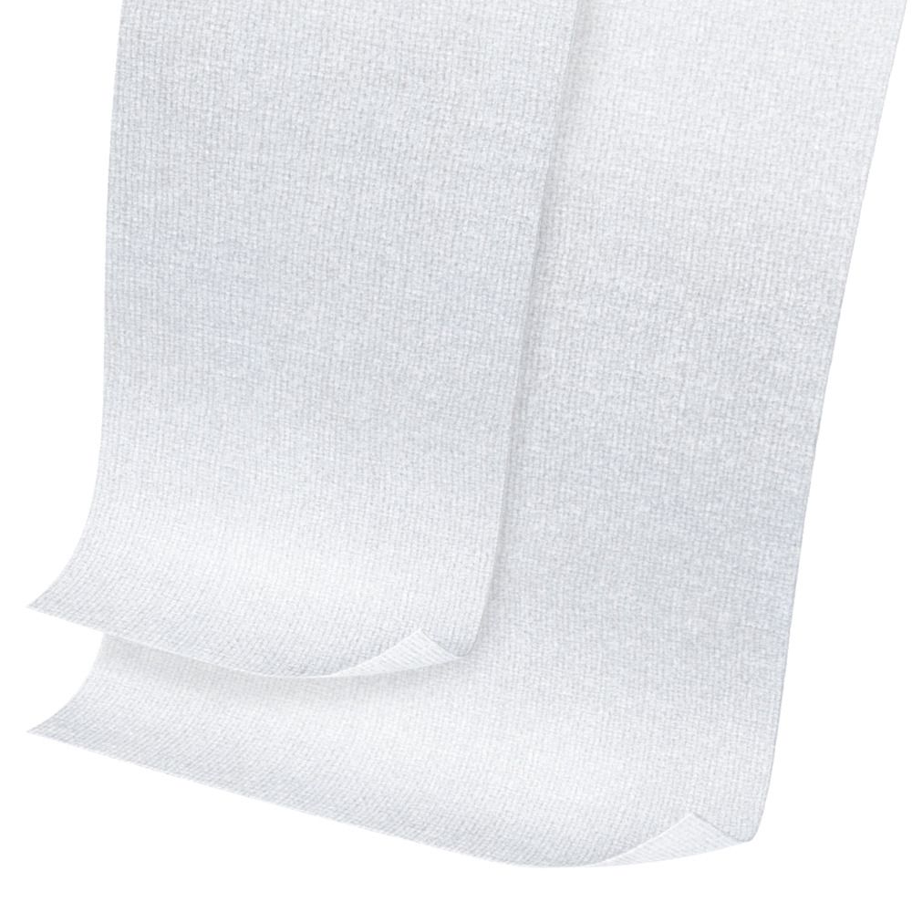 Due bende Gazofix bianche piegate. Il tessuto è leggermente strutturato.