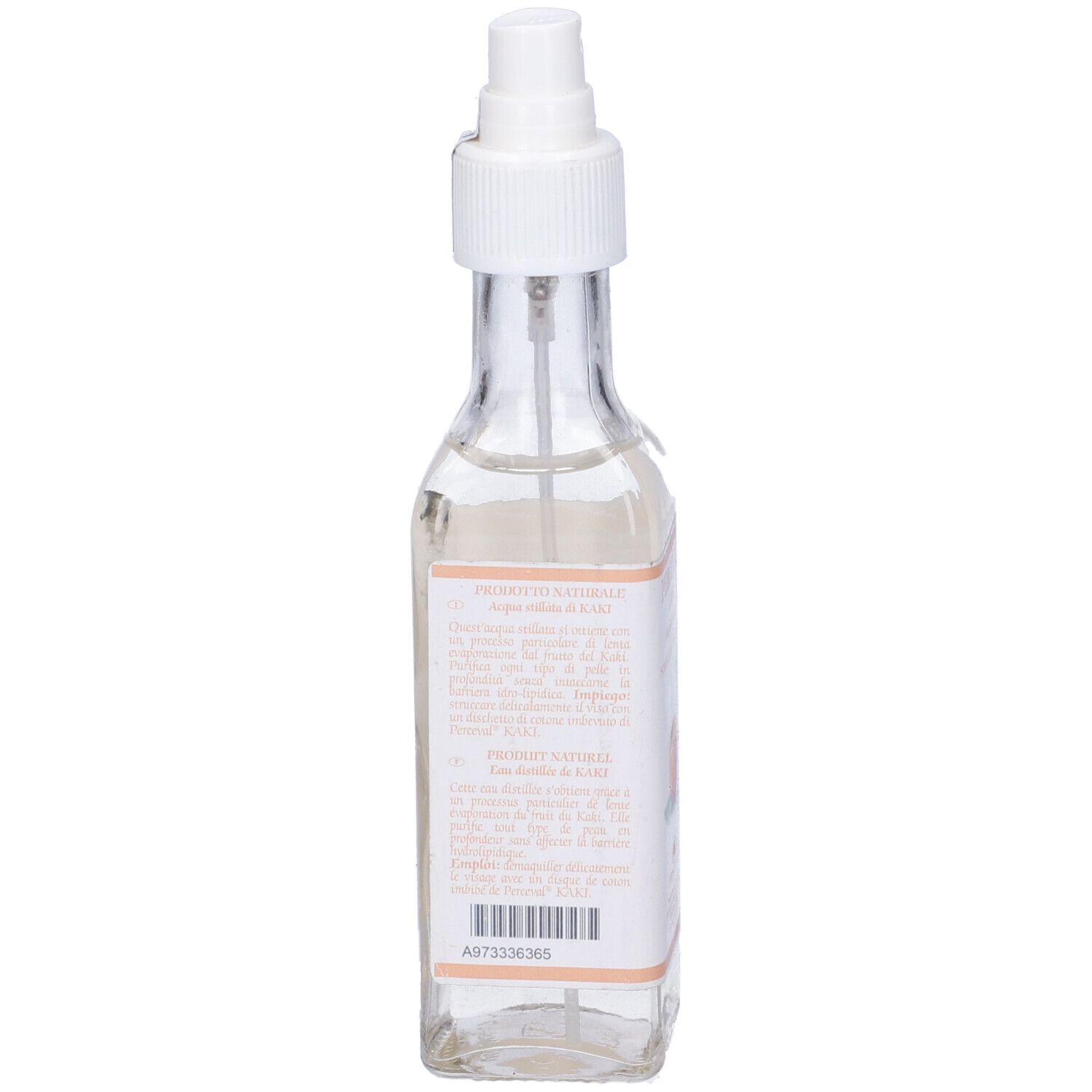 Retro di un flacone di vetro con spruzzatore. Etichetta con testo e codice a barre. Liquido visibile.