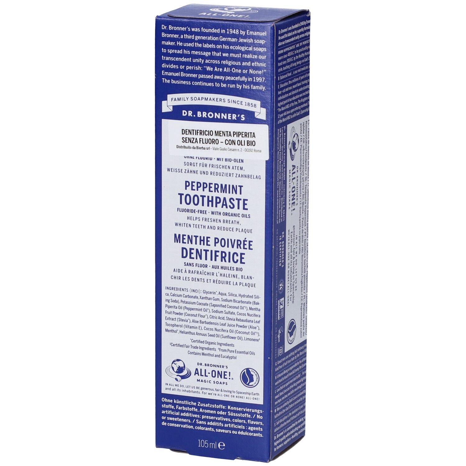 Scatola di cartone blu con testo. Dentifricio 'DR. BRONNER'S'. Testo in tedesco, inglese, francese e italiano. 105ml.