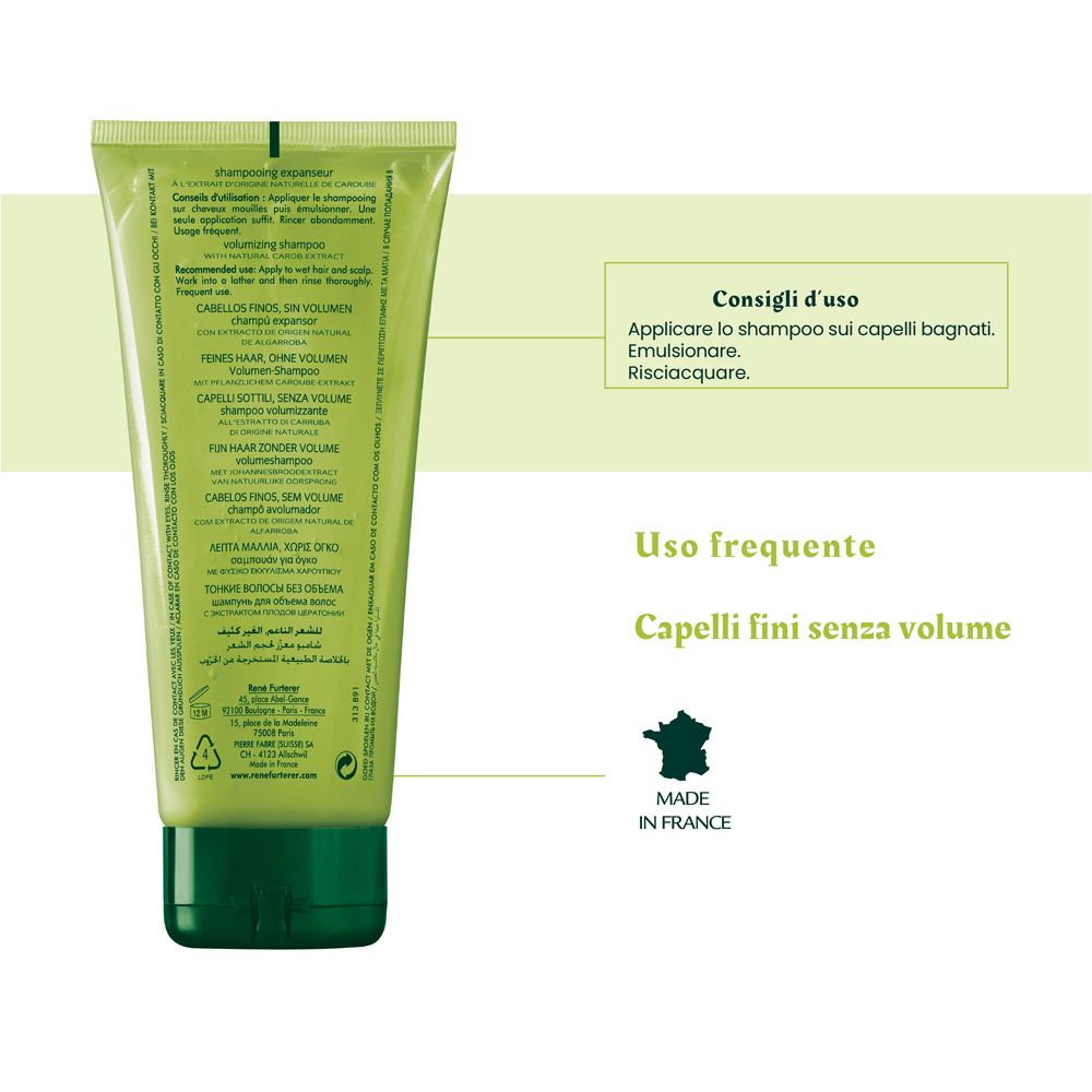 Retro del tubo di shampoo. Testo multilingue. Prodotto in Francia. Sfondo verde.