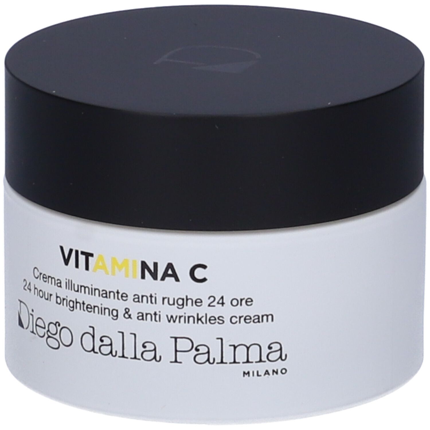 Vaso di crema con coperchio nero. Scritta: VITAMINA C, Crema illuminante anti rughe 24 ore, Diego dalla Palma.