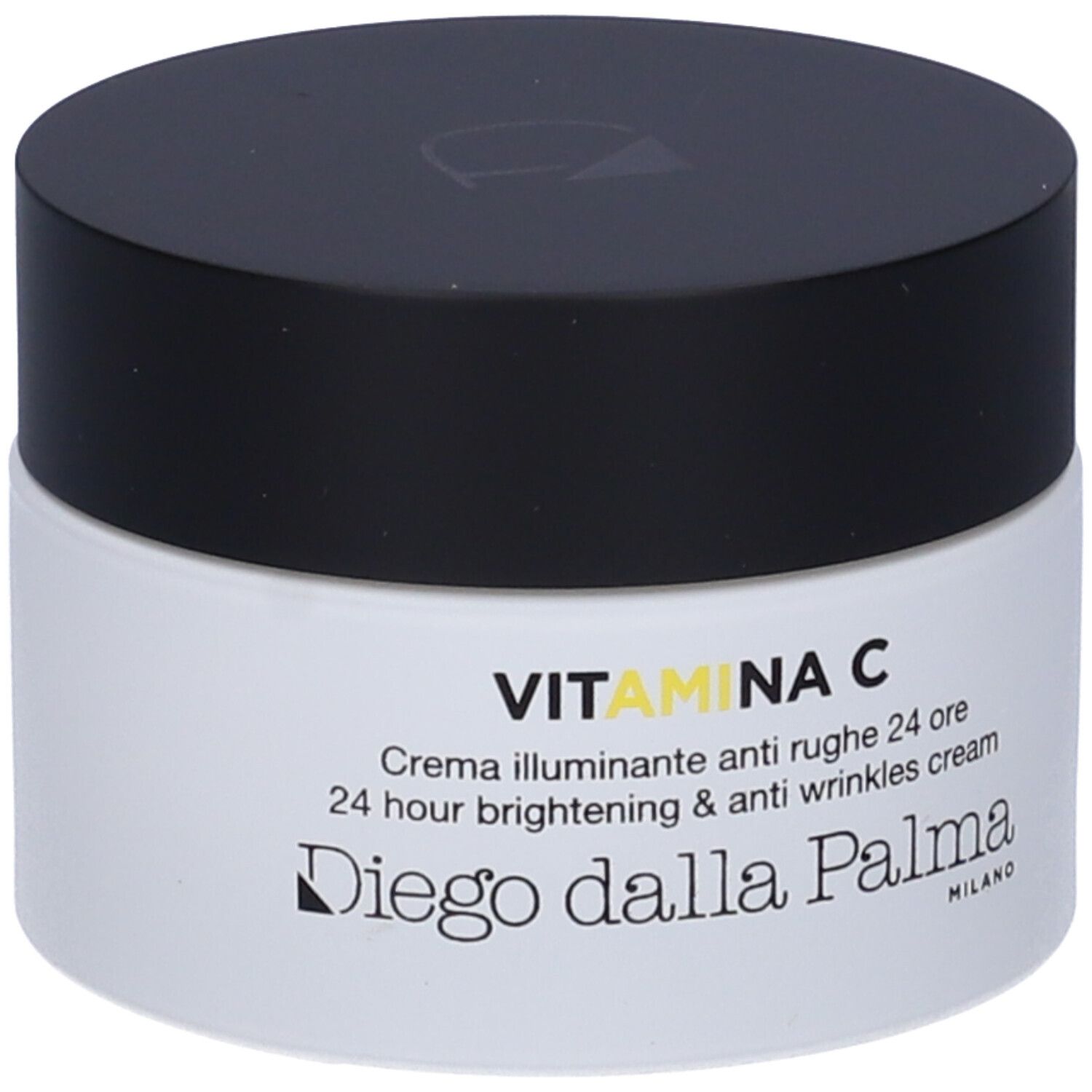 Vaso di crema con coperchio nero. Scritta: VITAMINA C, Crema illuminante anti rughe 24 ore, Diego dalla Palma.