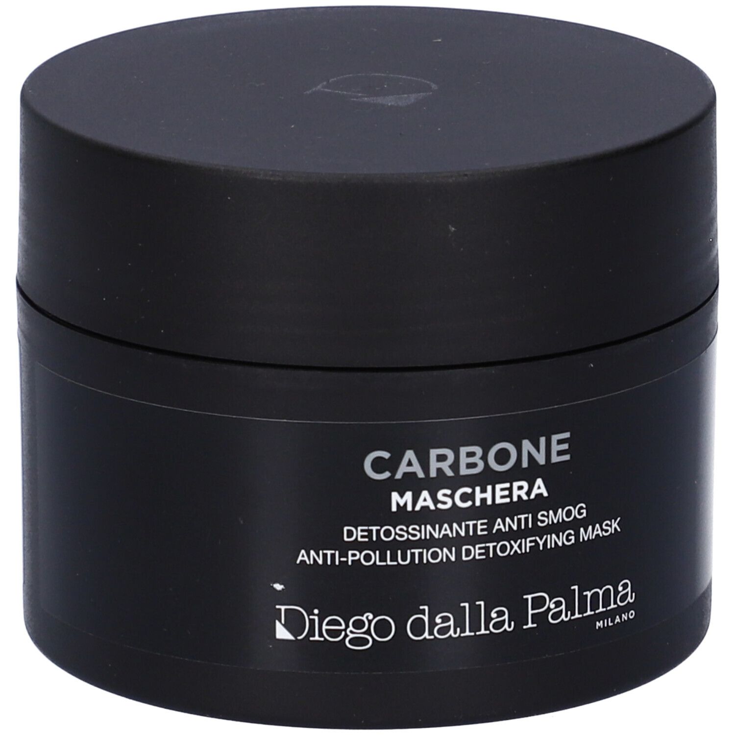 Vasetto nero con scritta "Carbone Maschera" e "Anti-Pollution Detoxifying Mask".