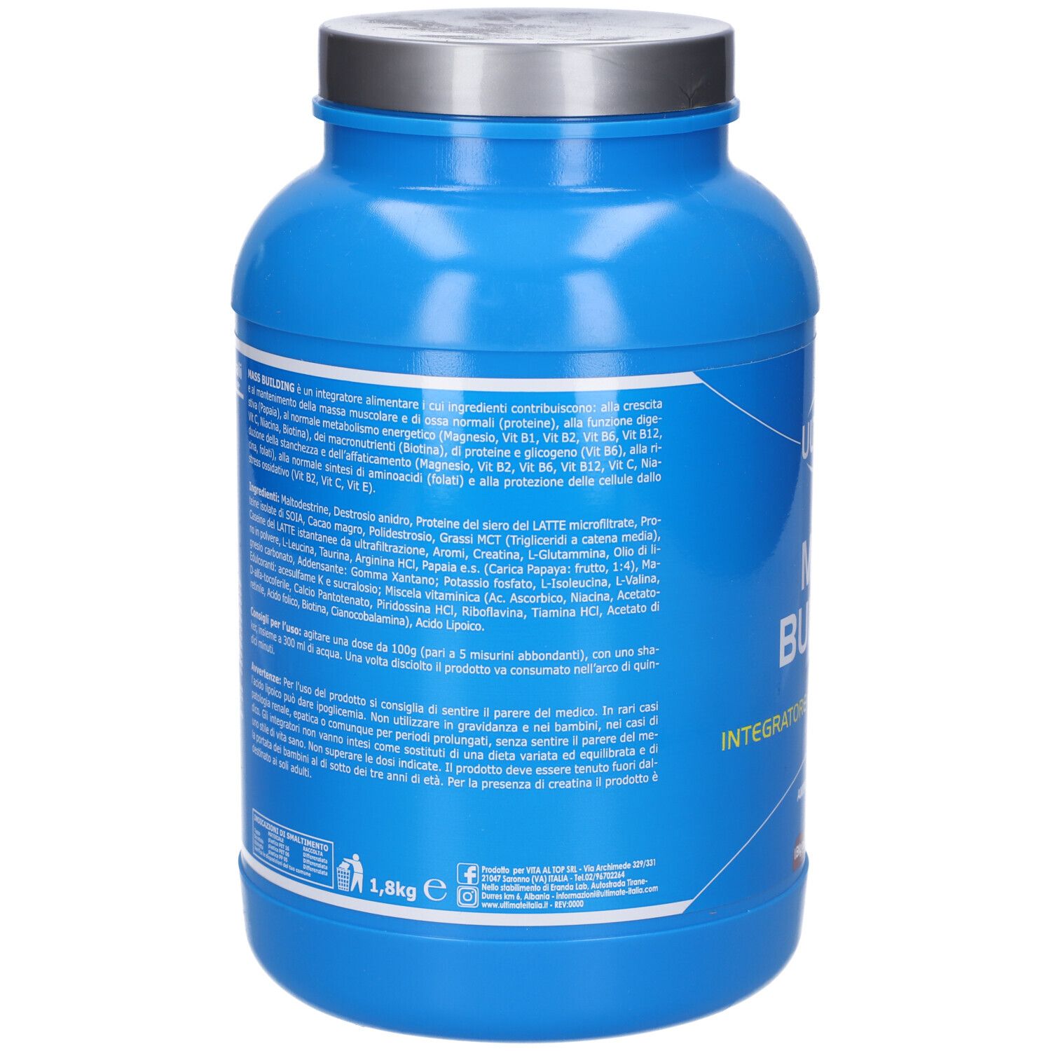 Retro del barattolo blu. Testo con ingredienti e informazioni nutrizionali. 1,8 kg. Scritta: Integratore proteico - glucidico.