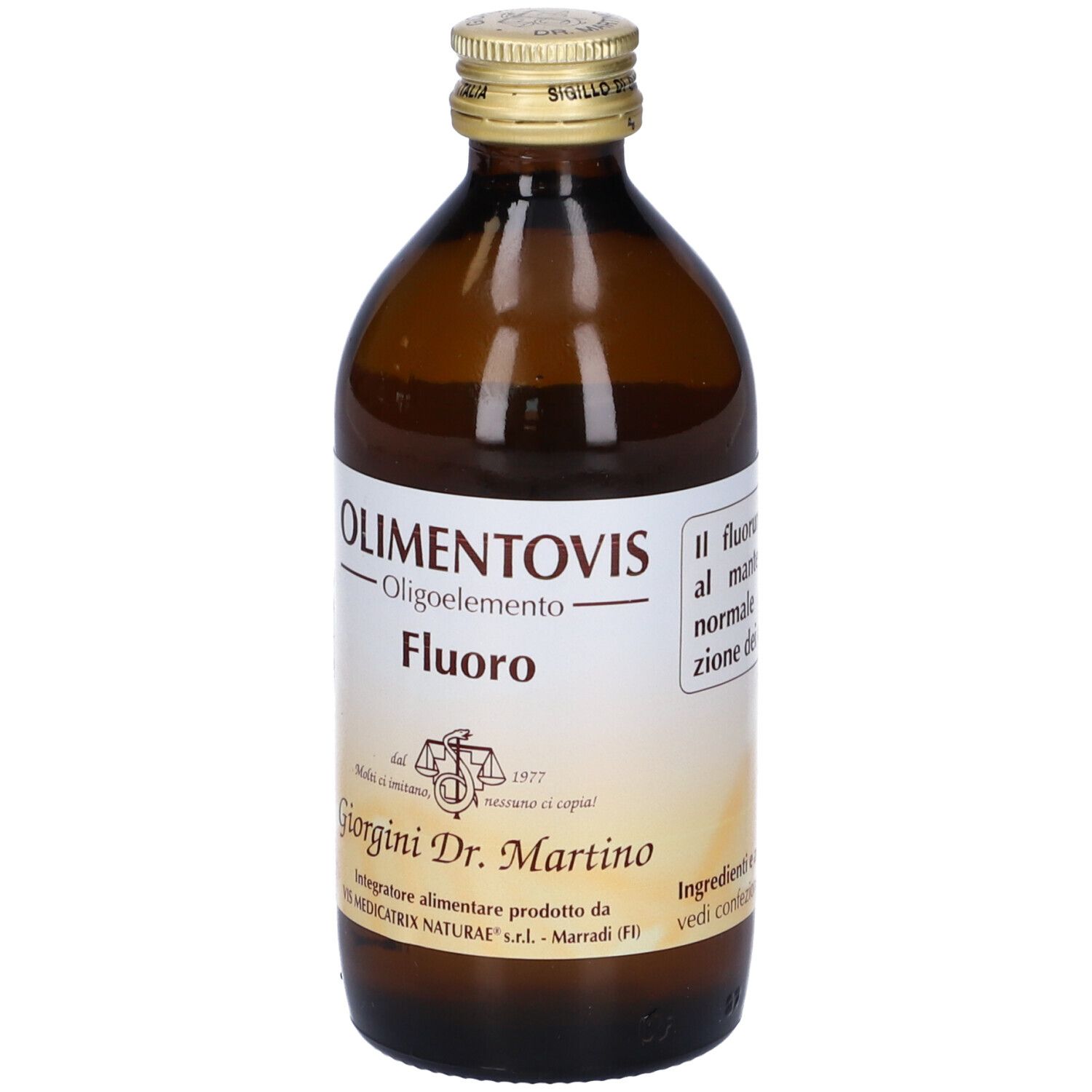 Bottiglia di vetro marrone con etichetta. Scritta: Olimentovis Fluoro. Marchio Giorgini Dr. Martino. Testo sugli ingredienti.