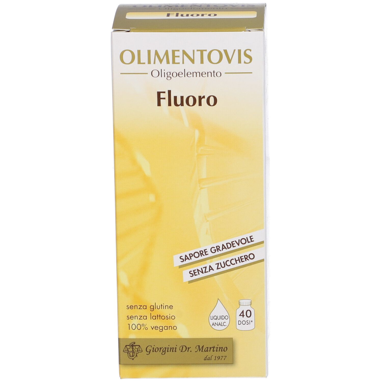 Scatola. Scritta: Olimentovis Fluoro. Marchio Giorgini Dr. Martino. Senza glutine, lattosio, 100% vegano.