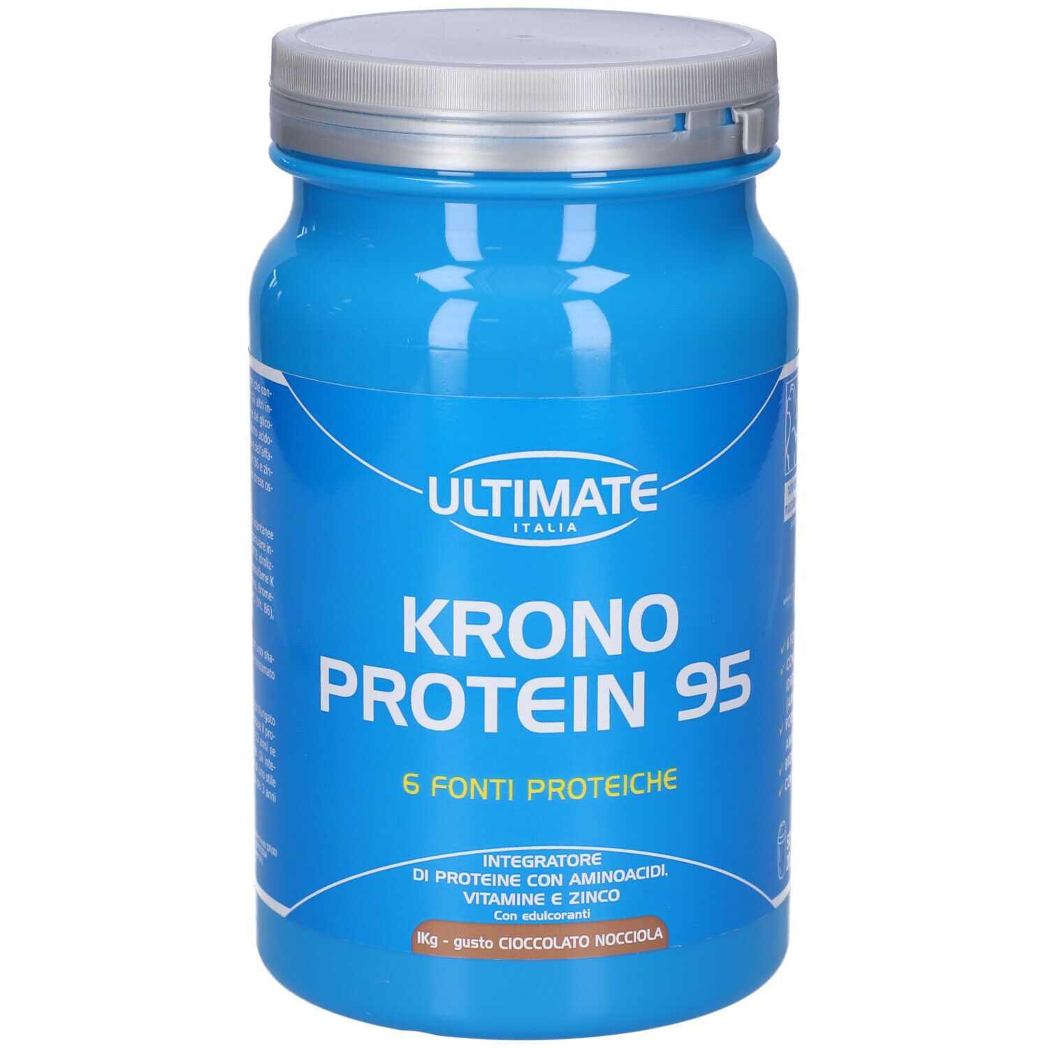 Barattolo blu con coperchio argentato. Scritta: ULTIMATE, KRONO PROTEIN 95, 6 fonti proteiche. Testo: Integratore di proteine con aminoacidi, vitamine e zinco.
