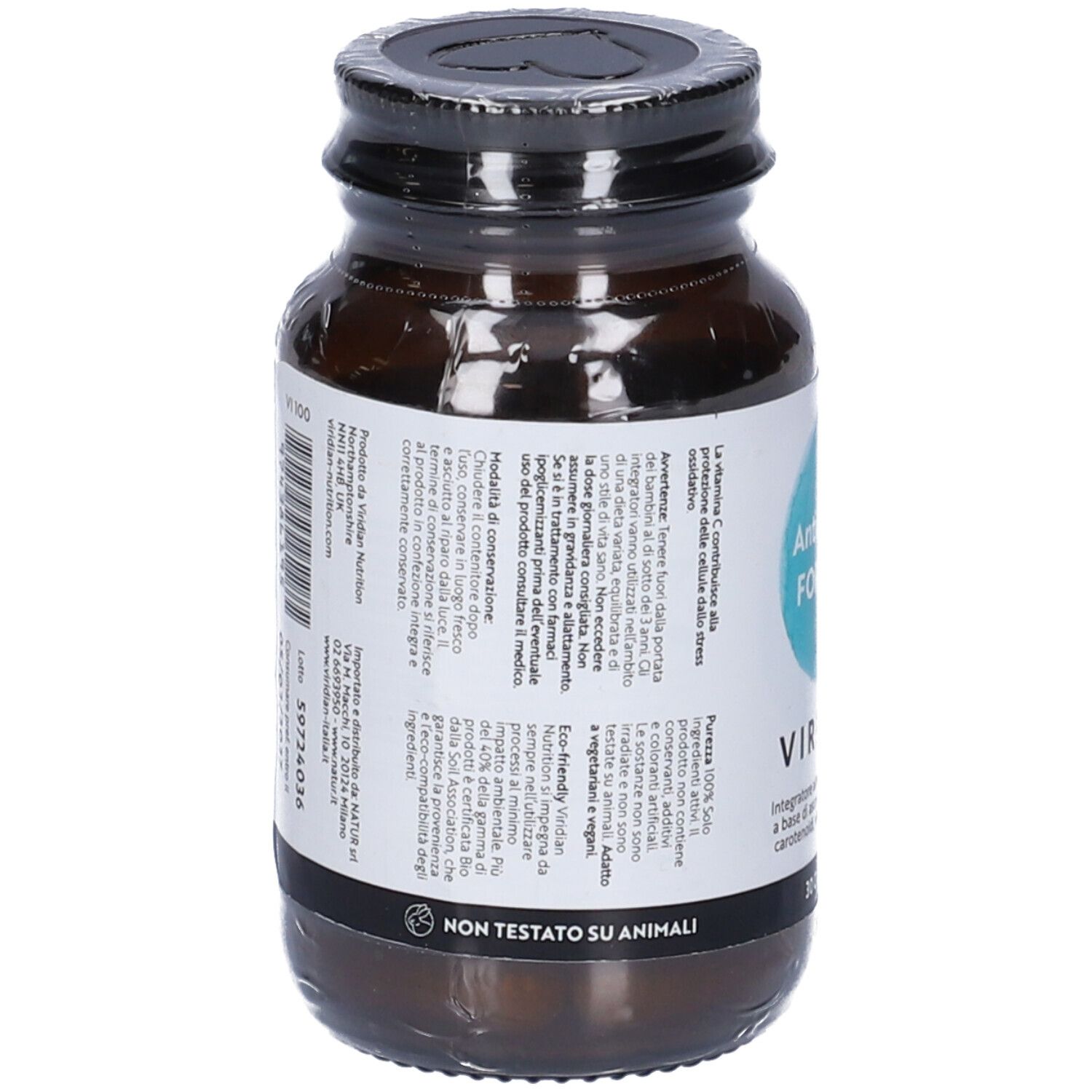 Vista posteriore del flacone di vetro marrone con capsule. Etichetta con testo. Scritta: Non testato su animali. Logo vegano.