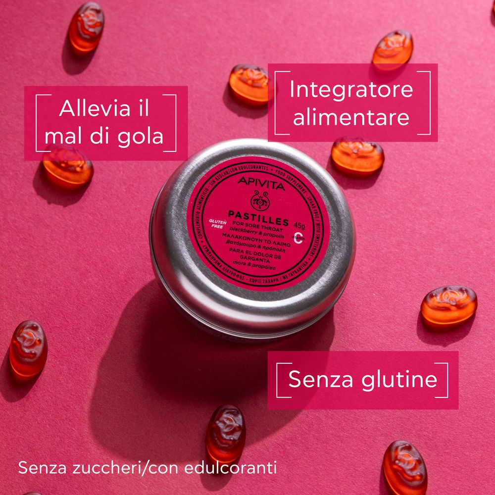 Barattolo rotondo con pastiglie rosse. Testo: Senza glutine, Integratore alimentare.