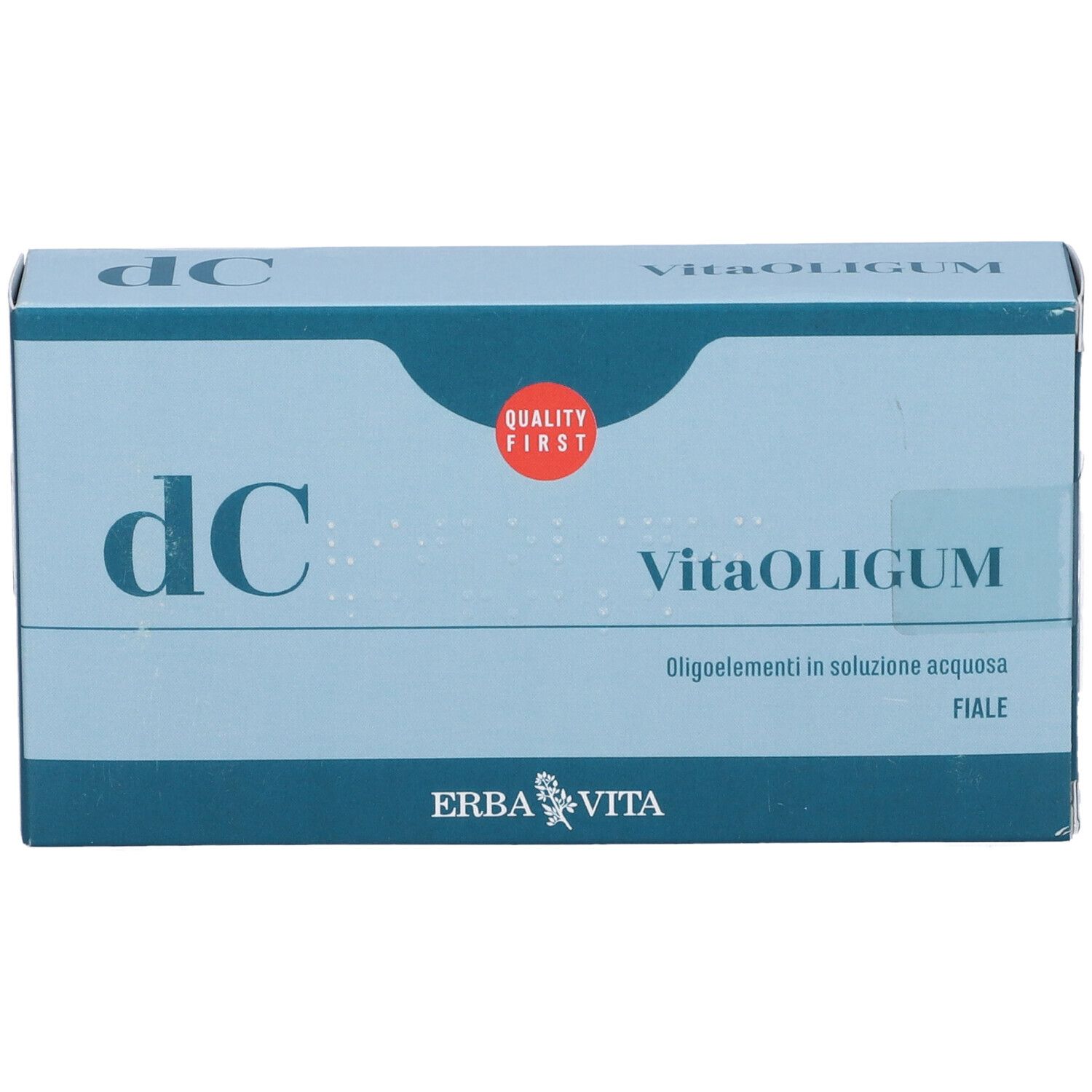 Scatola azzurra con logo "VitaOLIGUM" e "dc". Sigillo "Quality First". Logo "Erba Vita".