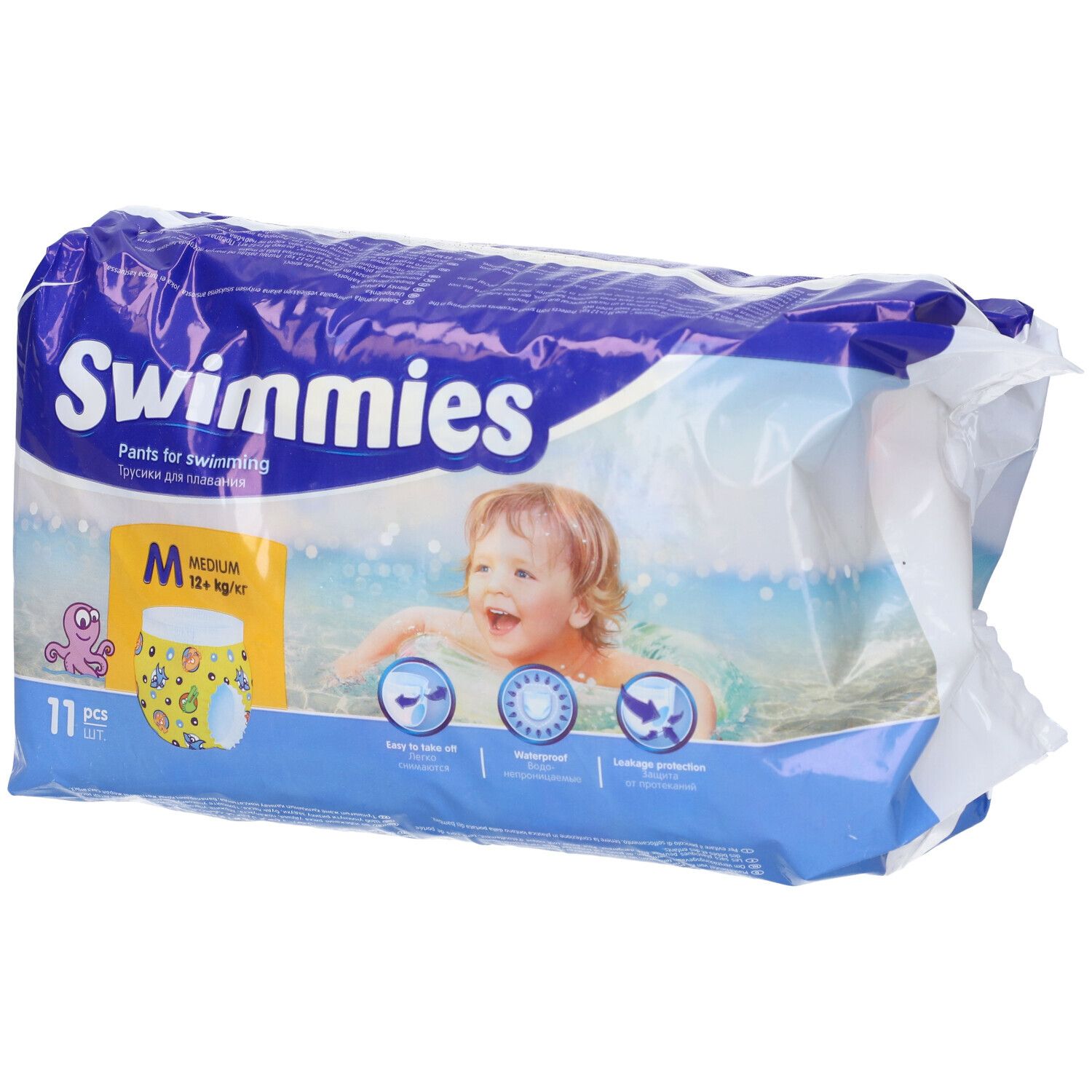 Confezione di Swimmies Pants per il nuoto. Taglia M, 12+ kg, 11 pezzi. Bambino sulla confezione.