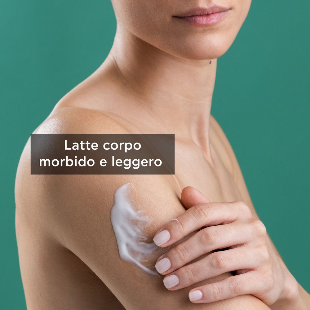 Persona con braccio con crema. Testo: Latte corpo, morbido e leggero.