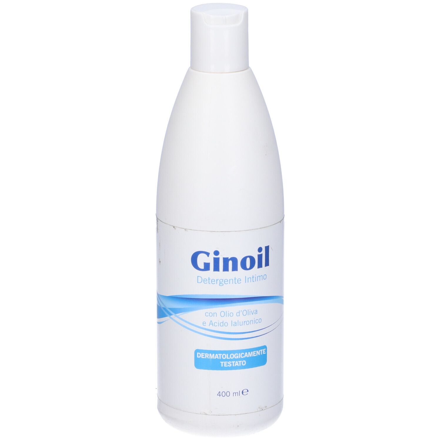 Flacone bianco con etichetta blu. Scritto: Ginoil, Detergente Intimo. Con olio d'oliva e acido ialuronico. Dermatologicamente testato. 400 ml.