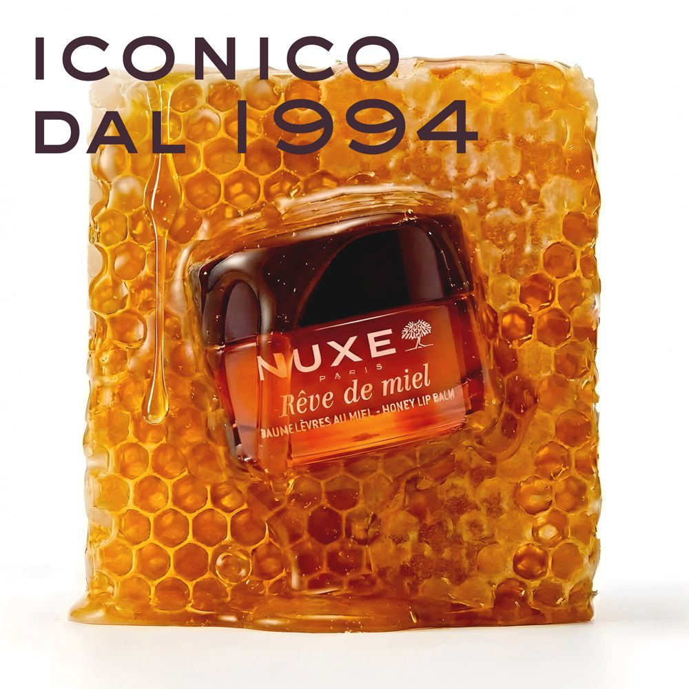 Balsamo labbra Nuxe Rêve de Miel in una cornice di favo.