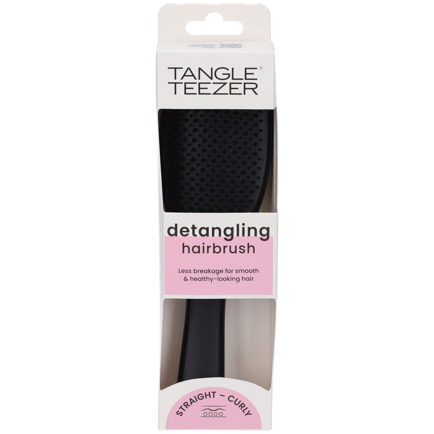 Spazzola nera in confezione. Marchio Tangle Teezer. Scritta: detangling hairbrush. Per capelli lisci e ricci.