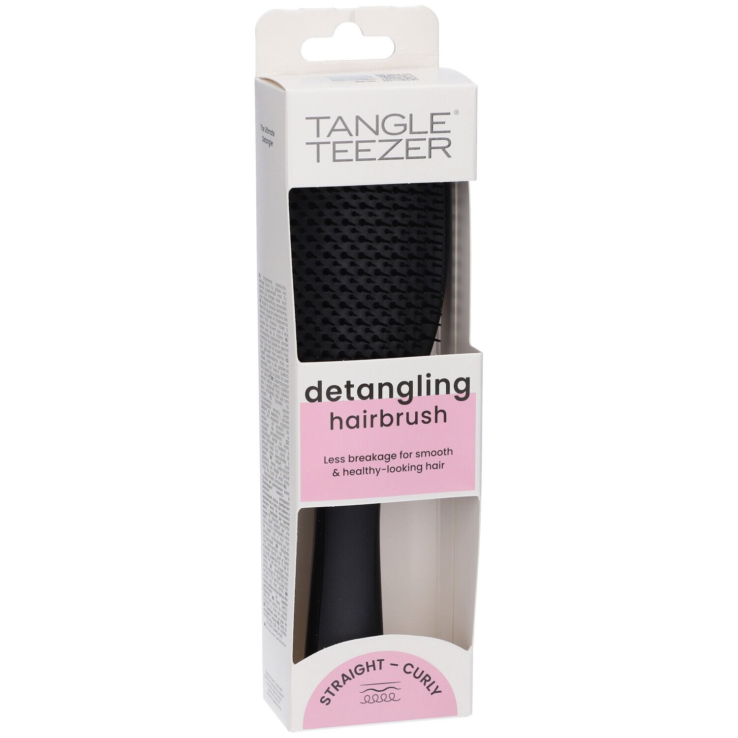 Spazzola nera in confezione. Marchio Tangle Teezer. Scritta: detangling hairbrush. Per capelli lisci e ricci.