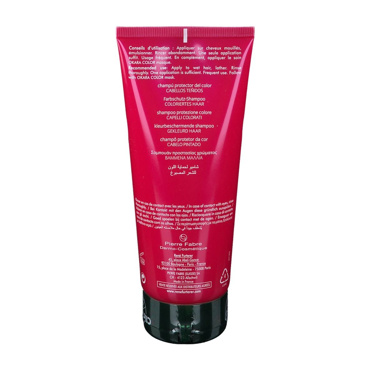 Retro del tubo rosa. Informazioni multilingue sul prodotto. Scritto: OKARA COLOR, shampoo protezione colore.