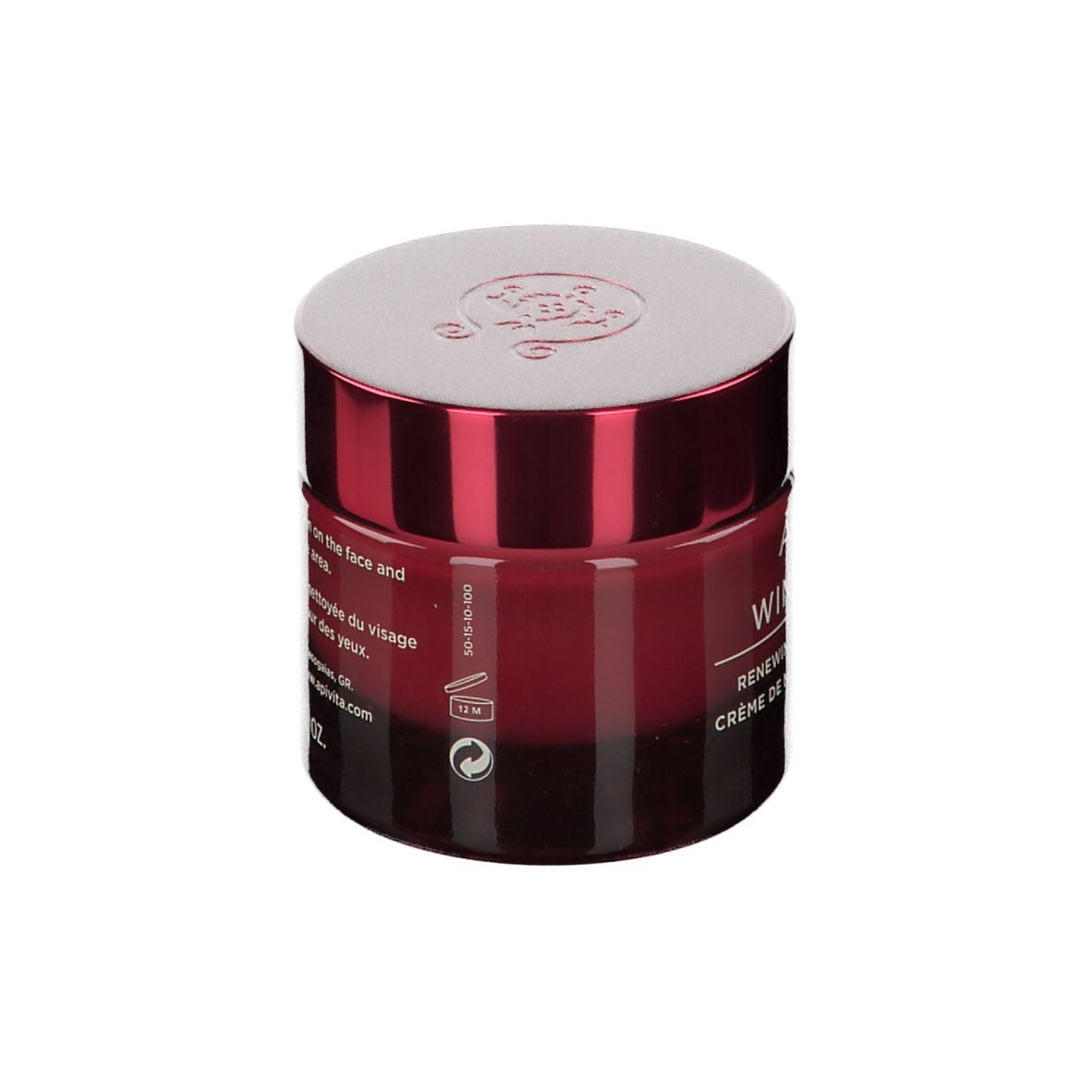 Vaso di crema bordeaux con coperchio bianco. Scritta: APIVITA WINE ELIXIR. Testo e volume.