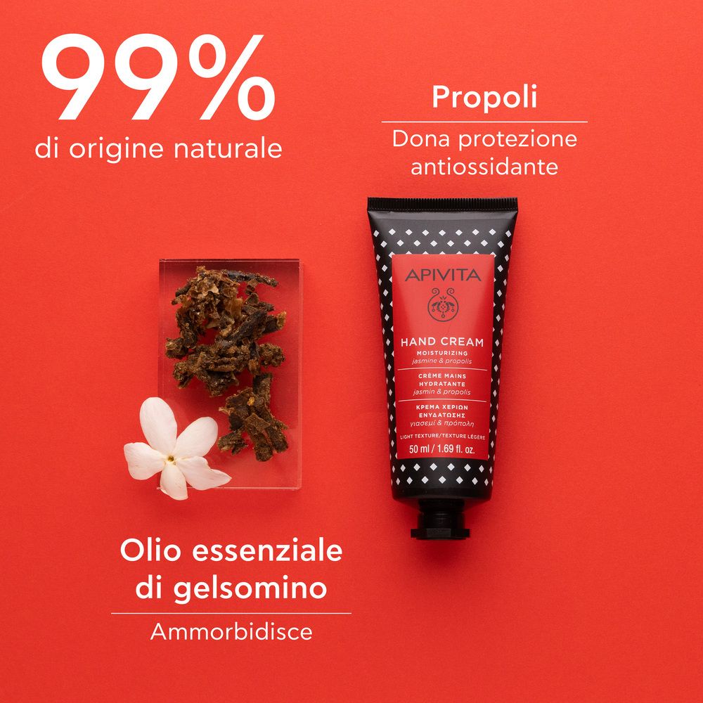 Tubo su sfondo rosso. Scritta: APIVITA, Hand Cream. Accanto: Propoli, fiore di gelsomino, Testo: 99% di origine naturale.