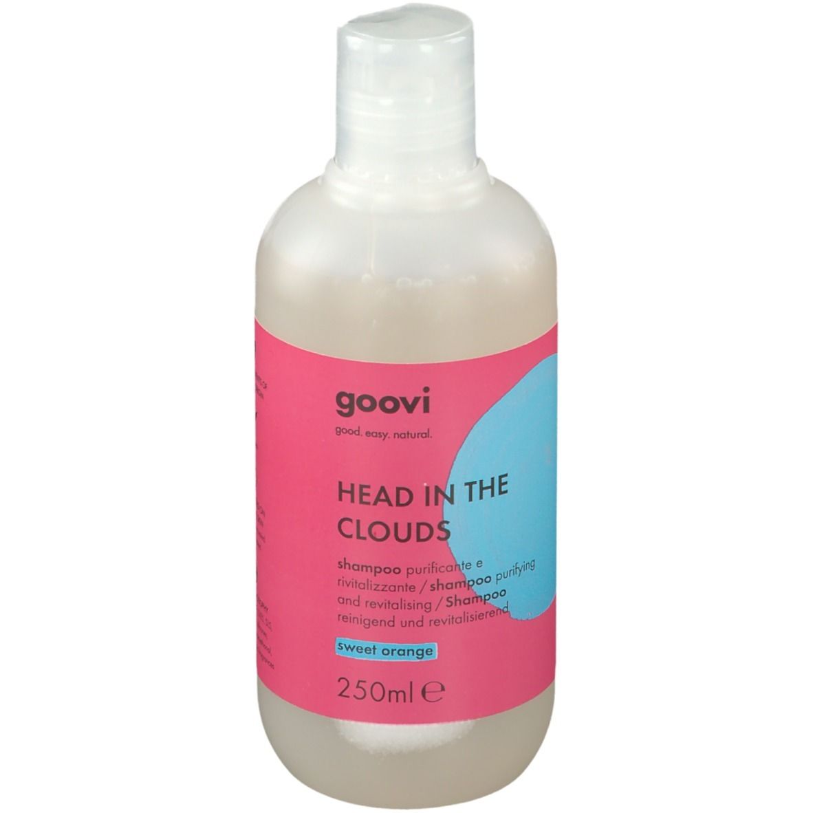Goovi Shampoo Head In The Clouds. Bottiglia con etichetta rosa, cerchio blu e testo. Contiene 250ml. Arancia dolce.
