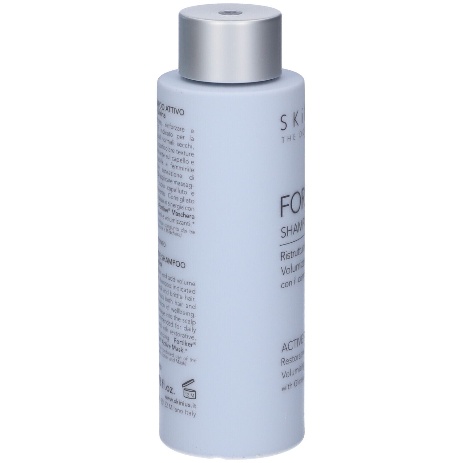Flacone di shampoo blu chiaro. Scritta: Fortiker Shampoo Attivo. Marchio: Skinius. Con complesso Gliksina. Testo sul retro.