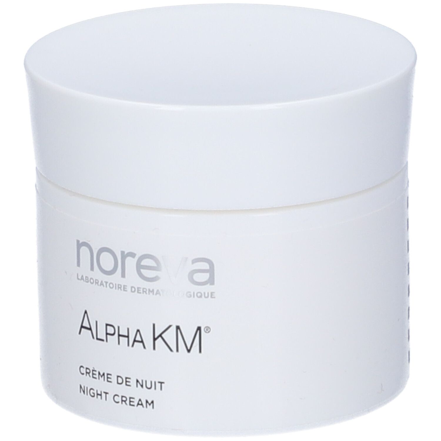 Vaso di crema bianco con coperchio. Scritta: Noreva, Alpha KM, Crème de Nuit, Night Cream.
