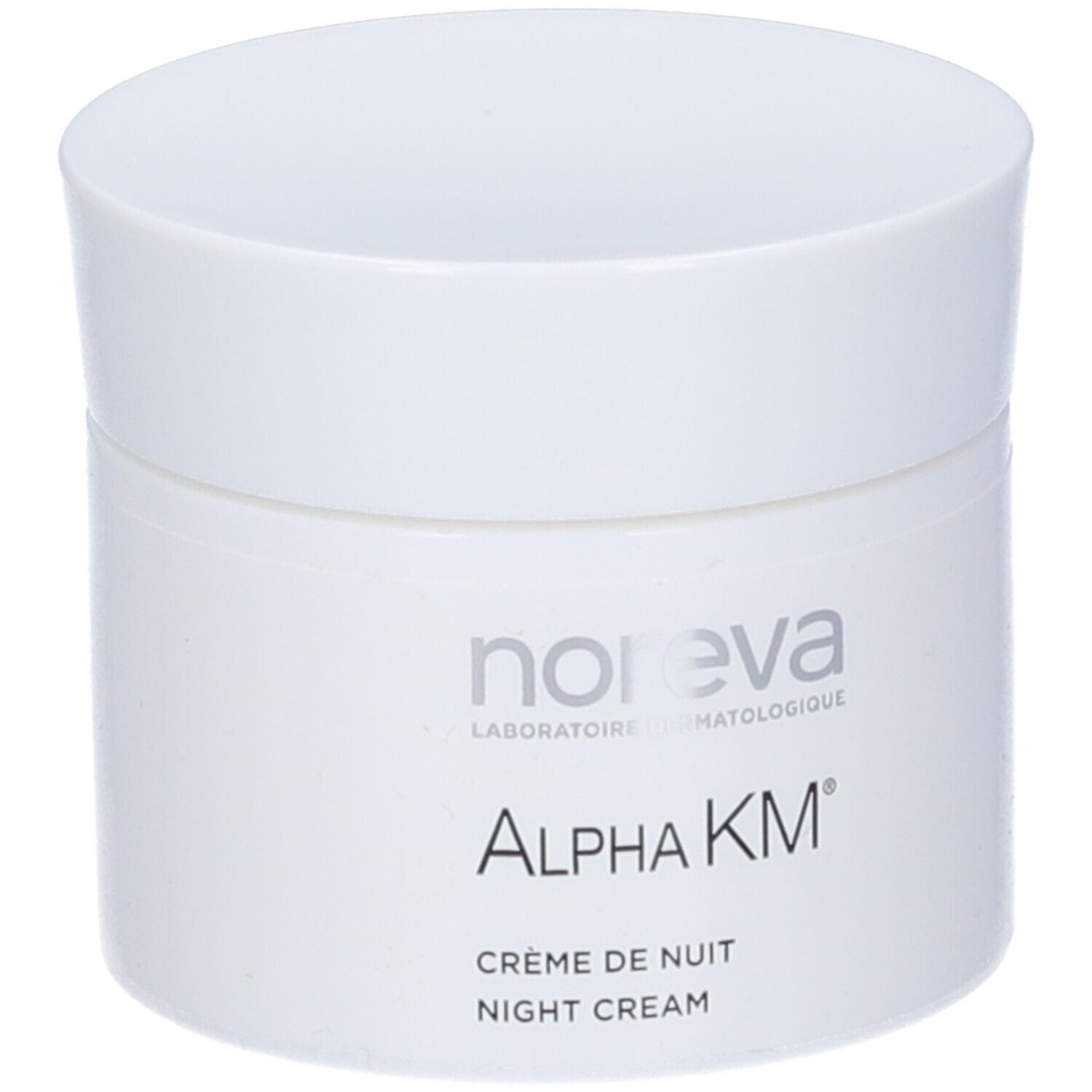 Vaso di crema bianco con coperchio. Scritta: Noreva, Alpha KM, Crème de Nuit, Night Cream.