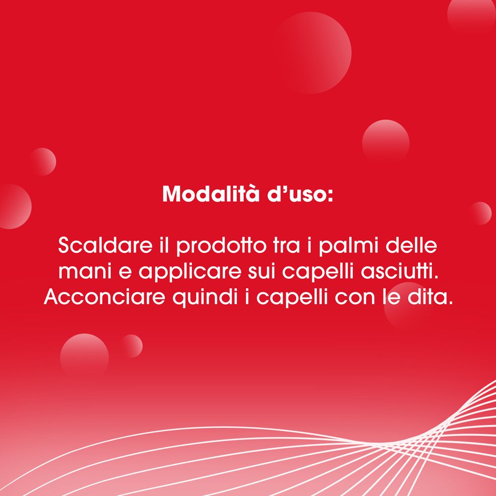 Testo su sfondo rosso. Titolo: Modalità d'uso. Descrive l'applicazione del prodotto sui capelli asciutti.