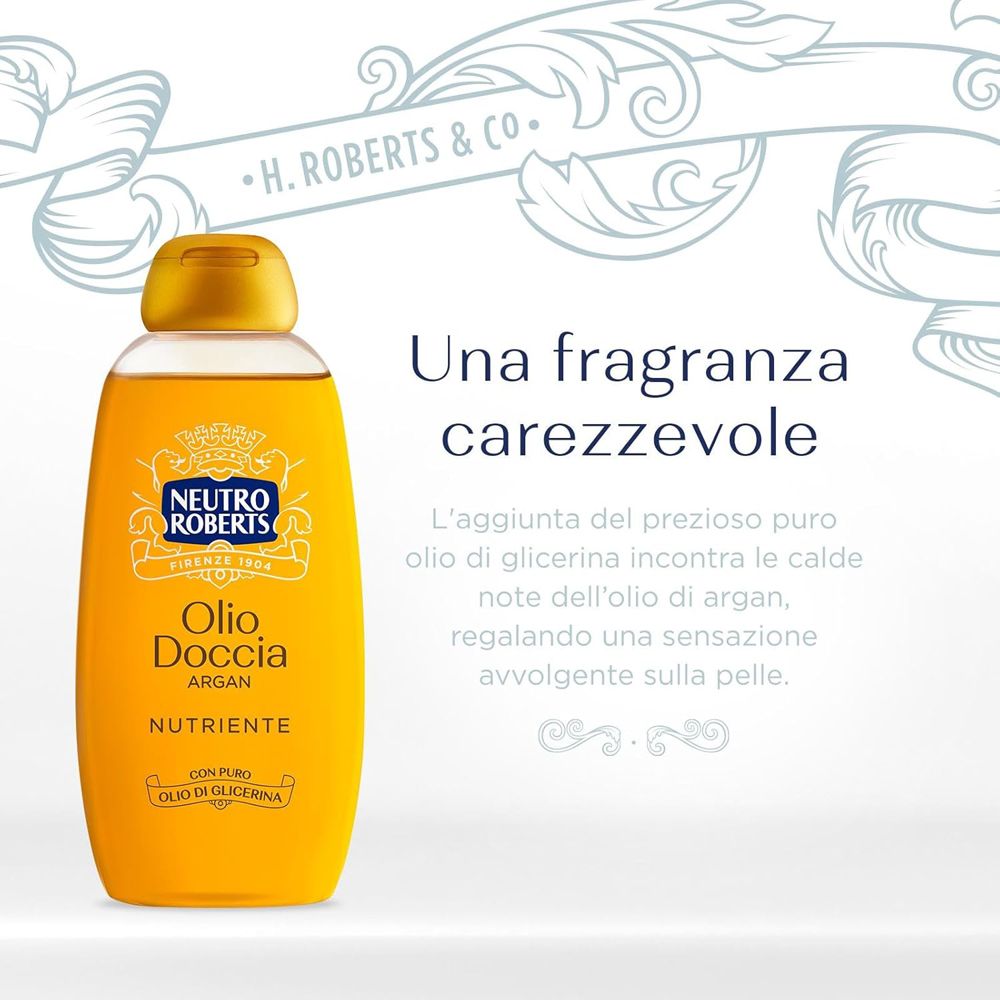 Flacone giallo con tappo dorato. Testo: Neutro Roberts, Olio Doccia Argan, Nutriente. Testo: Una fragranza carezzevole.