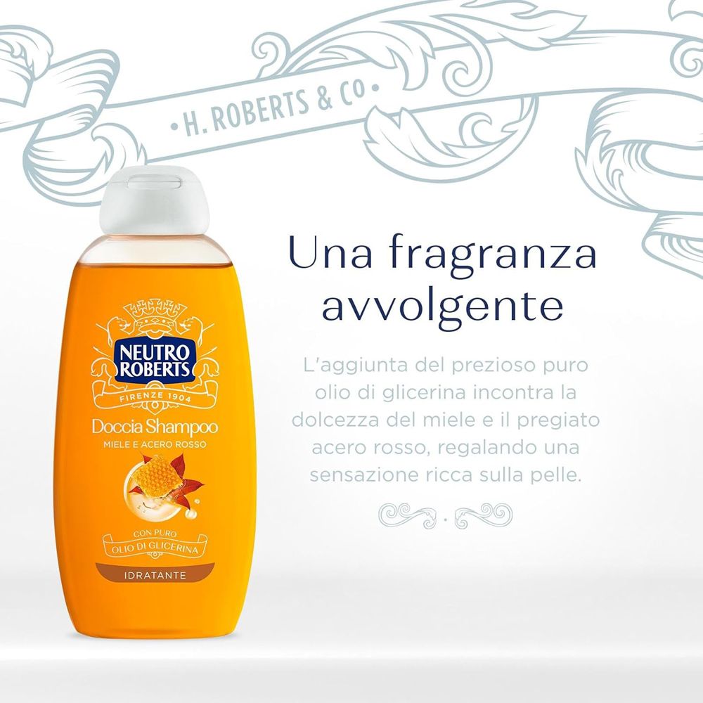 Flacone Neutro Roberts Doccia Shampoo. Testo: Una fragranza avvolgente. Descrizione del prodotto con miele e acero.
