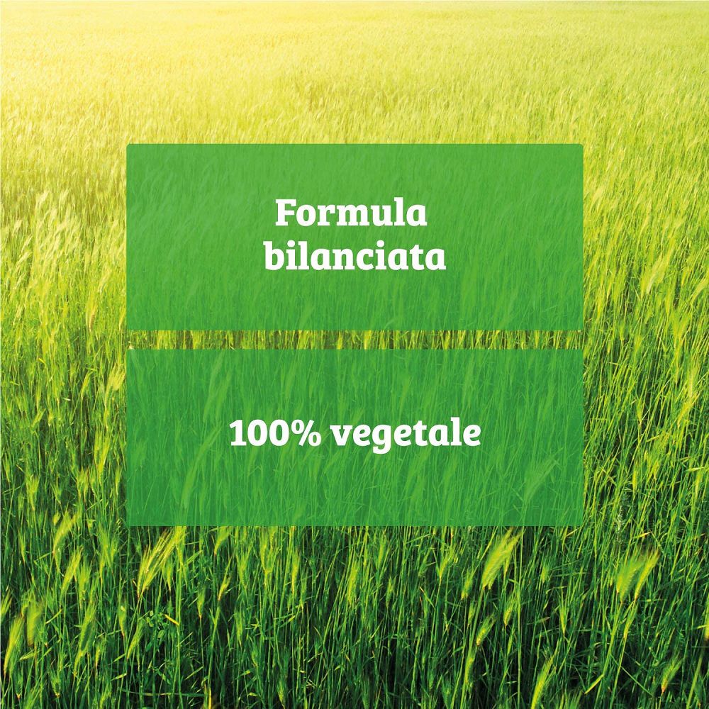 Aree di testo 'Formula bilanciata' e '100% vegetale' davanti a un campo.