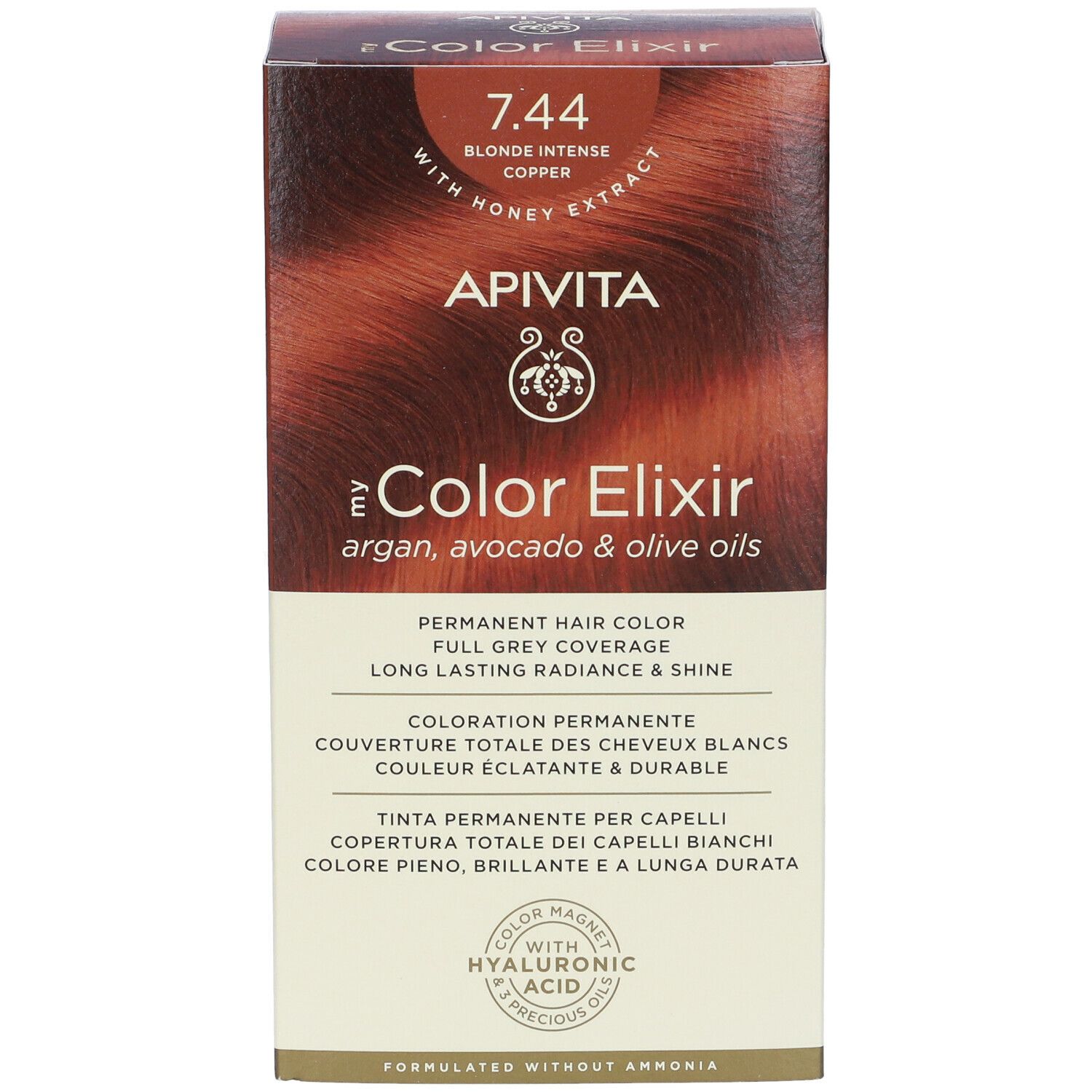 Confezione in cartone con informazioni sul prodotto. Scritta: APIVITA, eColor Elixir, 7.44 Biondo Intenso Ramato. Contiene oli di argan, avocado e oliva.