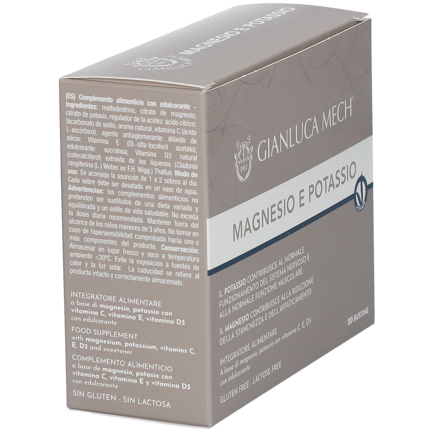 Scatola grigia con "GIANLUCA MECH" e "MAGNESIO E POTASSIO". Contiene 20 bustine. Logo vegano. Testo sugli ingredienti.