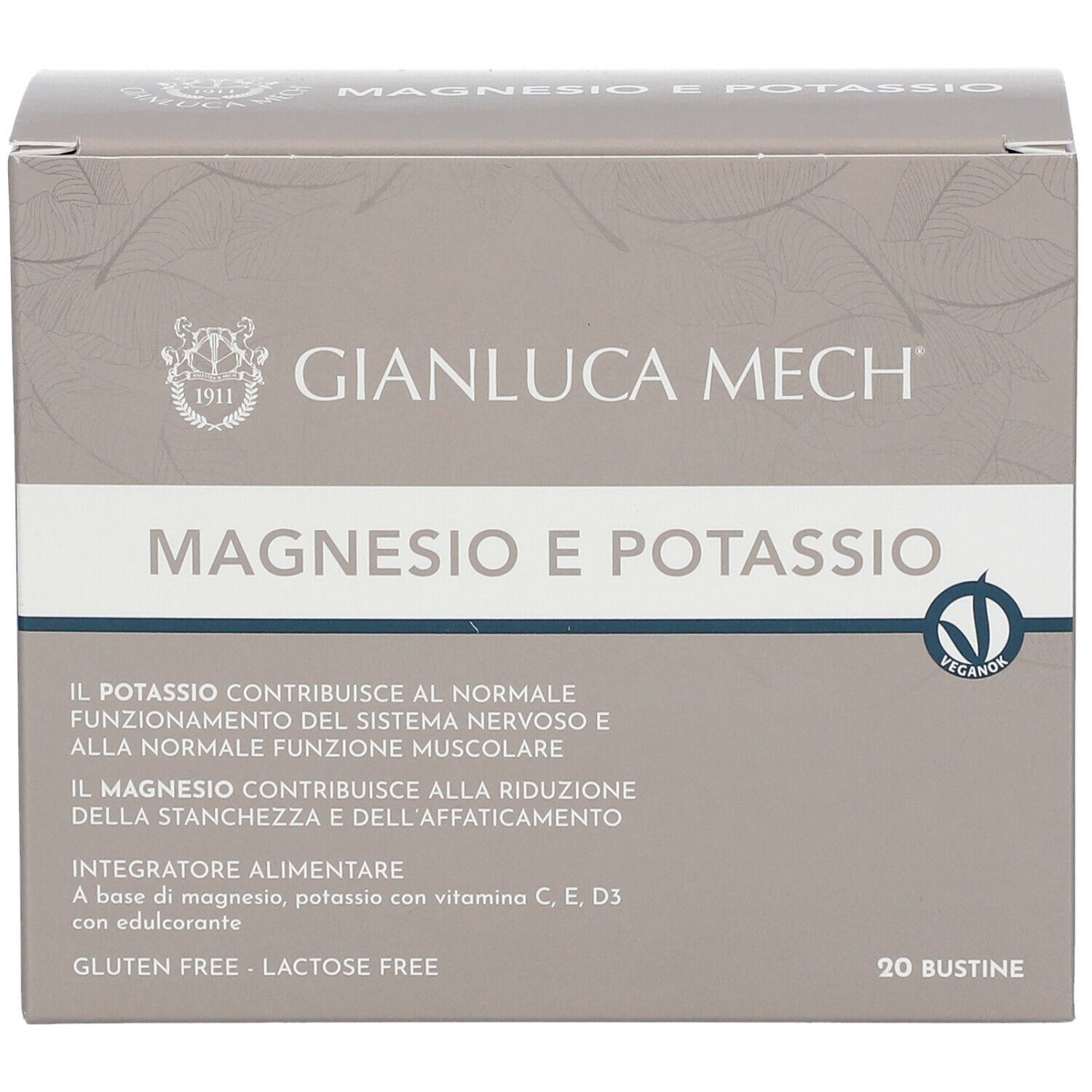 Scatola grigia con "GIANLUCA MECH" e "MAGNESIO E POTASSIO". Contiene 20 bustine. Logo vegano.