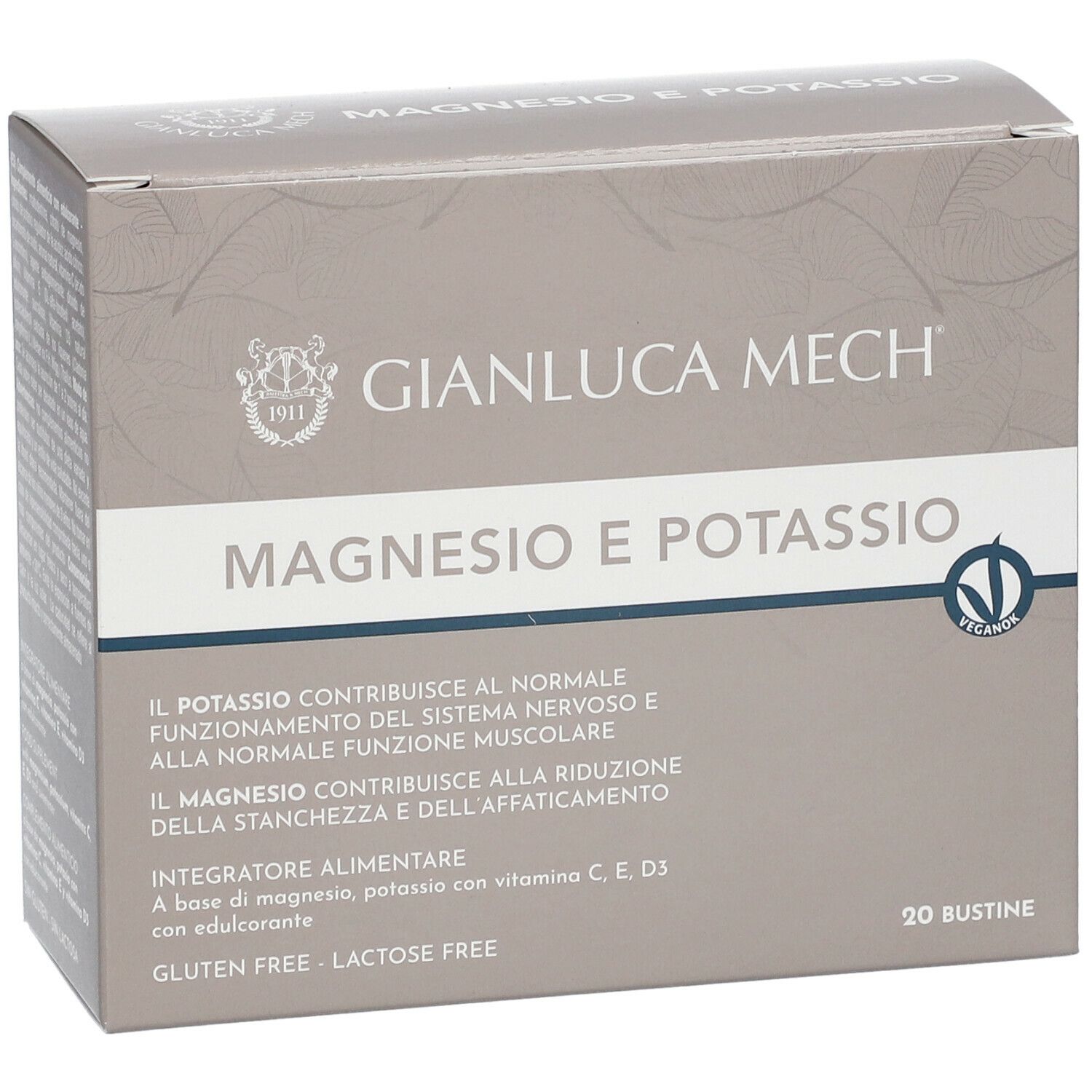 Scatola grigia con "GIANLUCA MECH" e "MAGNESIO E POTASSIO". Contiene 20 bustine. Logo vegano.