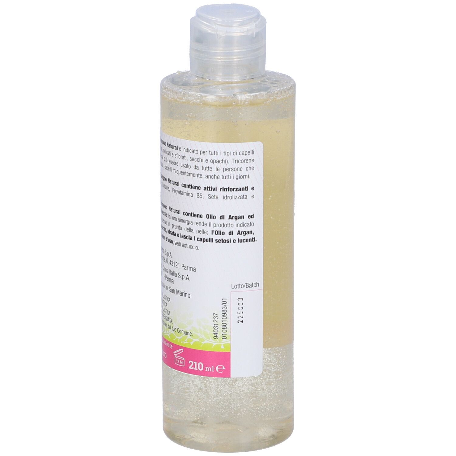 Flacone di shampoo Tricorene. Flacone trasparente con liquido giallastro. Con tappo a ribalta. Retro con informazioni sul prodotto.