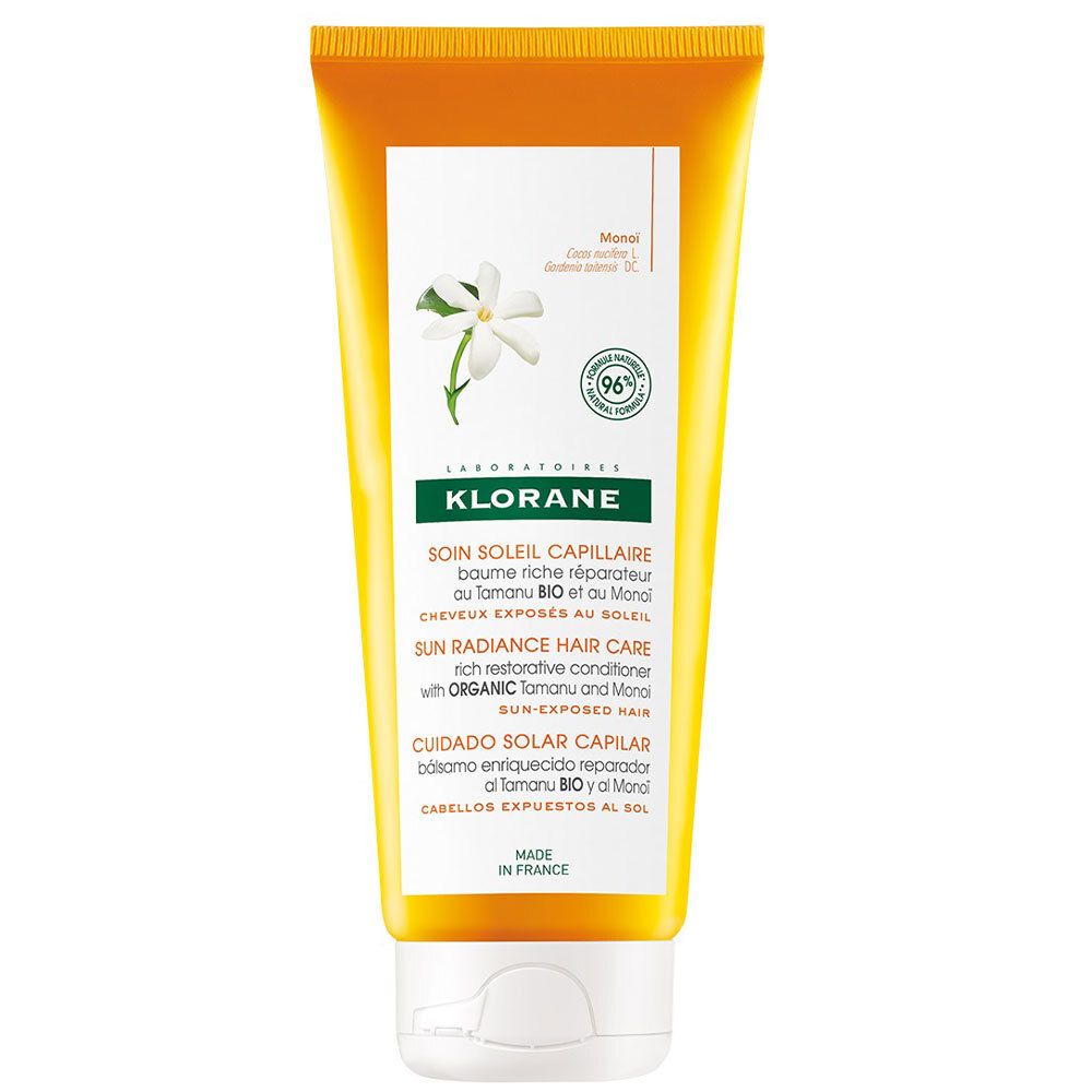 Tubo giallo con tappo bianco. Testo: KLORANE, Sun Radiance Hair Care. Contiene Tamanu BIO e Monoi. 96% ingredienti di origine naturale.