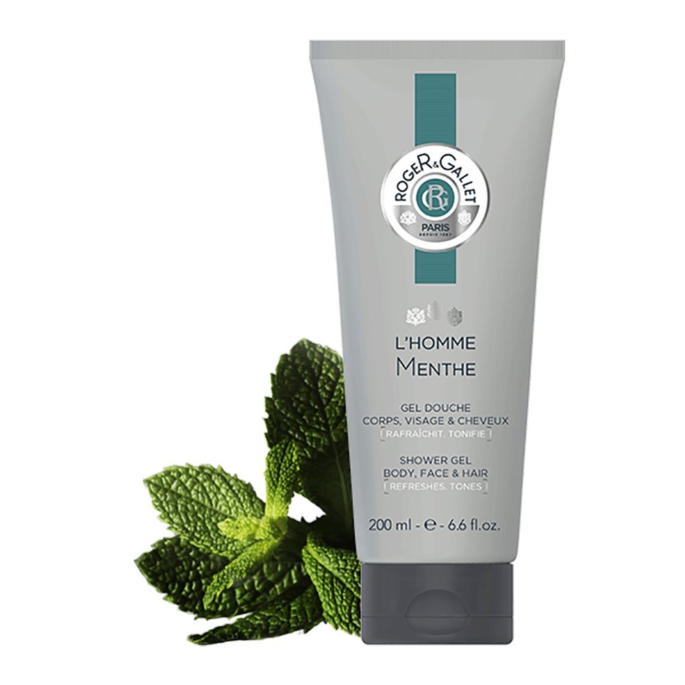 Tubo grigio con logo e testo. L'Homme Menthe, Gel Douche, Corpo, Viso & Capelli. Rametto di menta accanto.
