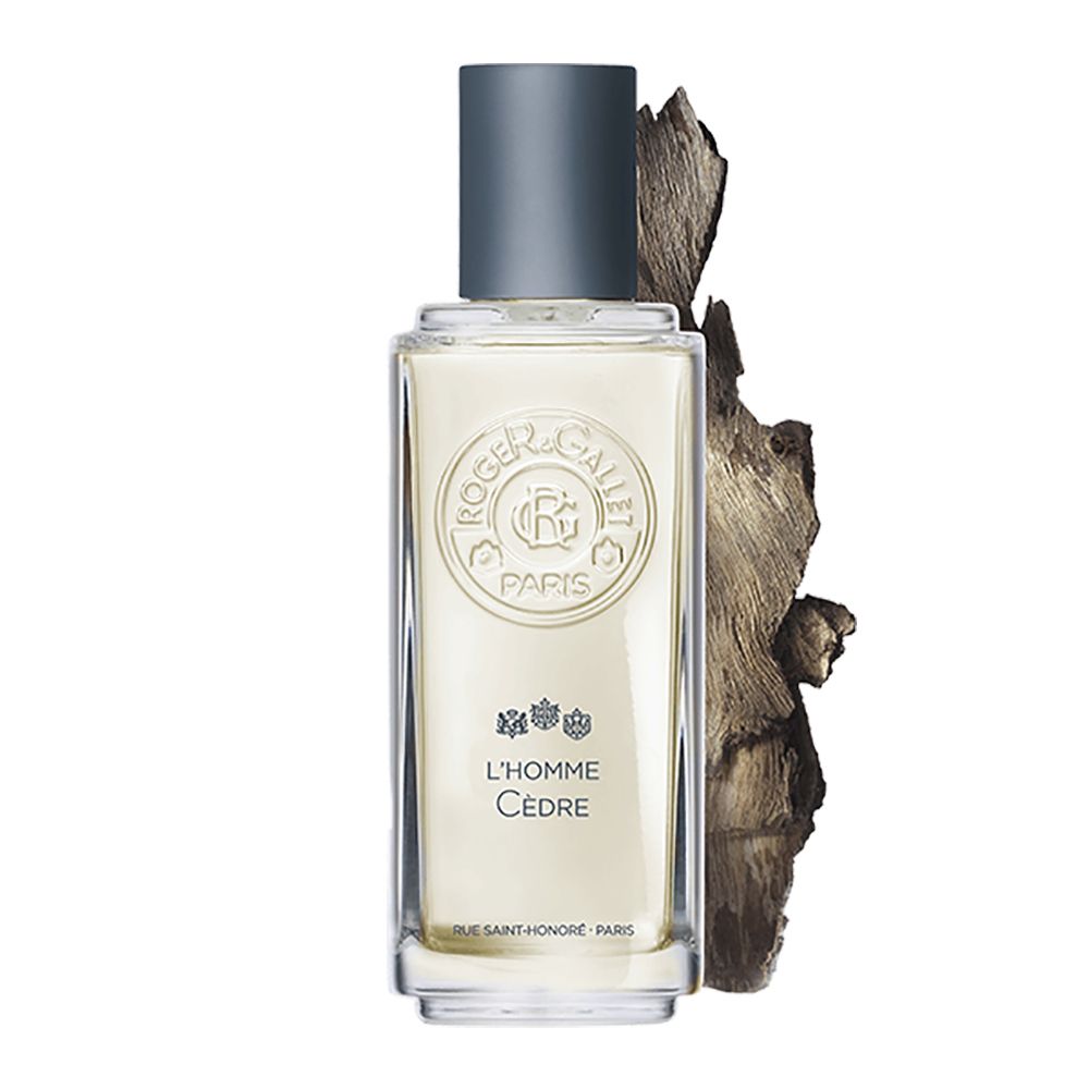 Flacone Roger & Gallet L'Homme Cèdre con pezzo di legno. Forma rettangolare, tappo grigio.