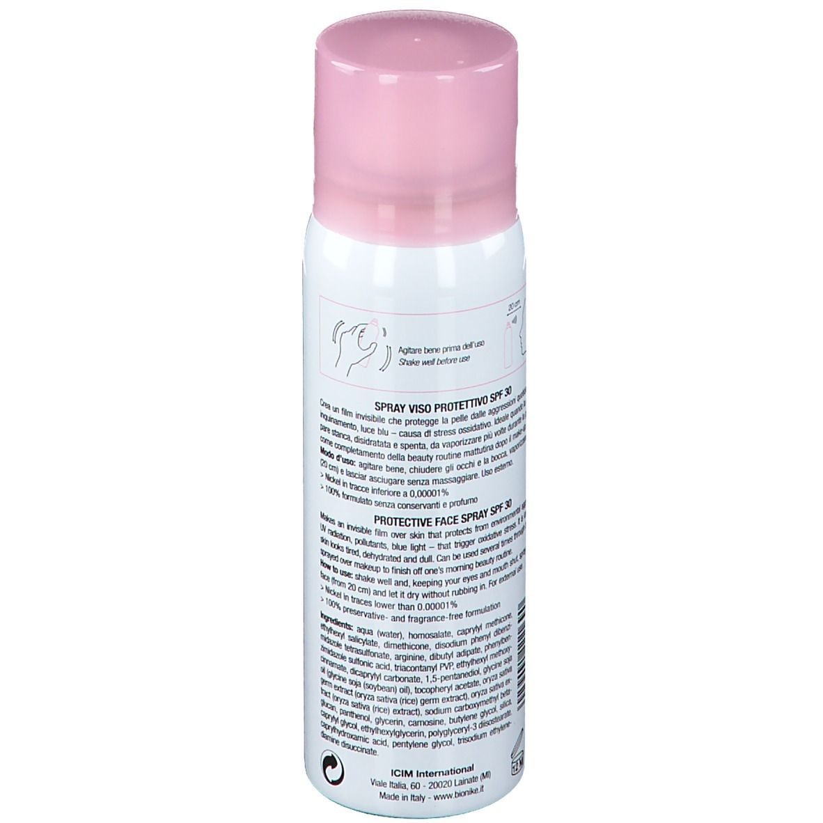 Spray bianco con tappo rosa. Retro con ingredienti e istruzioni per l'uso.