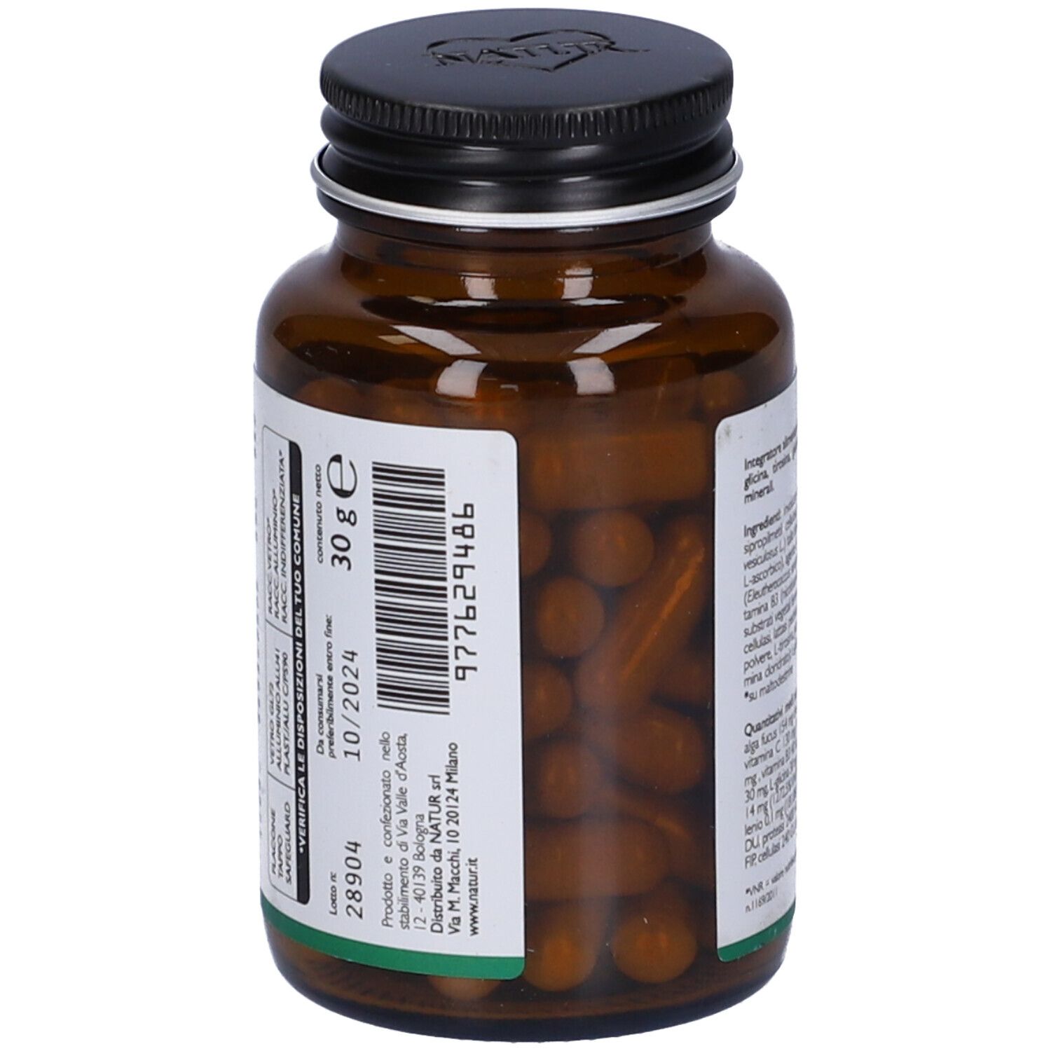 Flacone di vetro marrone con tappo nero. Etichetta con ingredienti e data di scadenza.